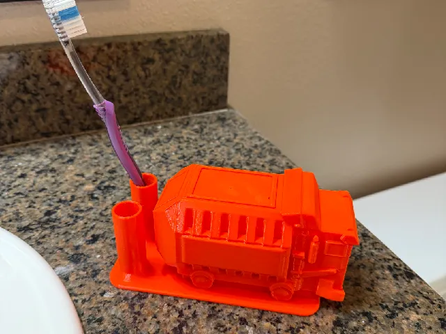 A Trash Truck Like Tooth Brush Holder