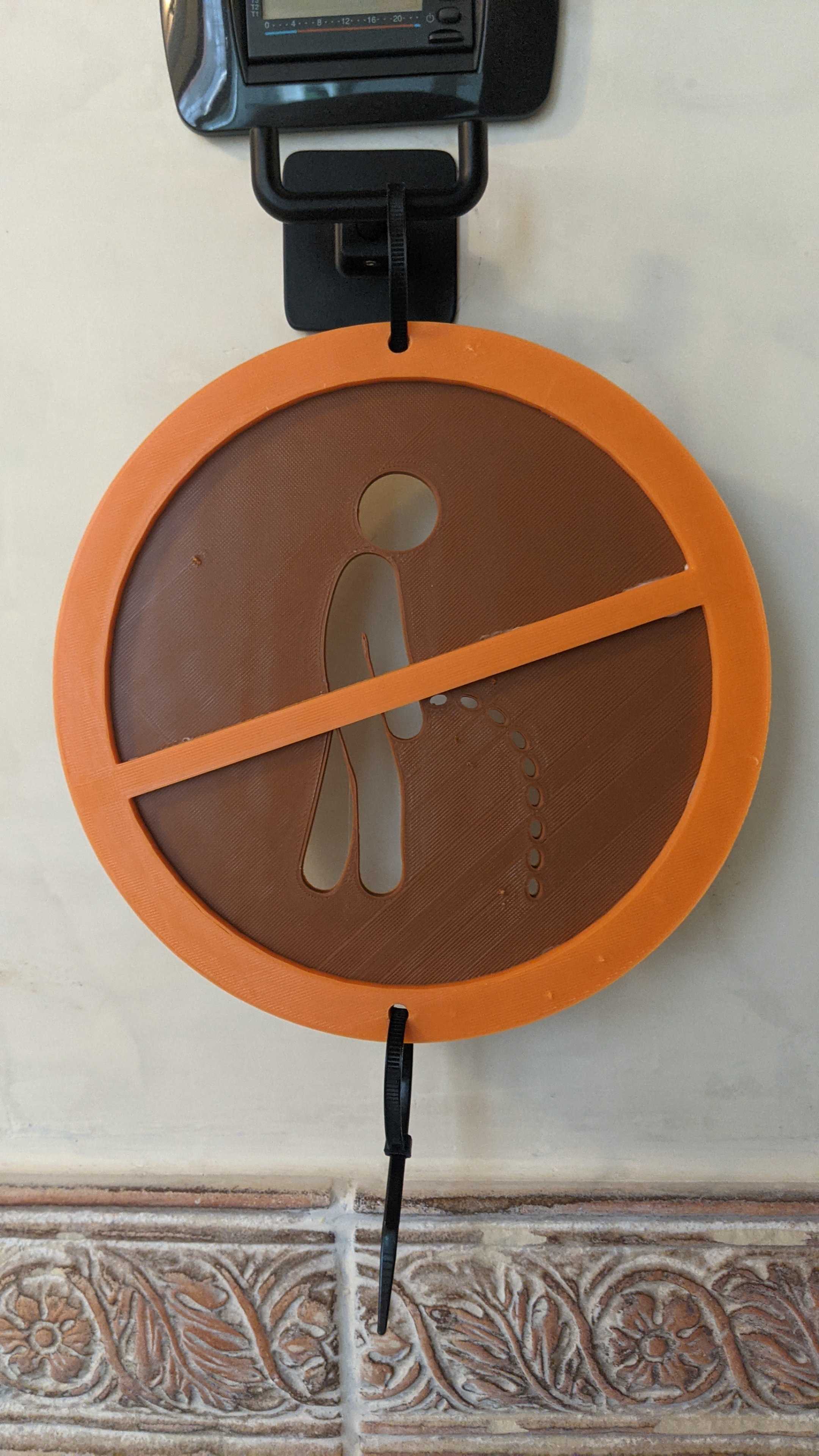 no peeing sign