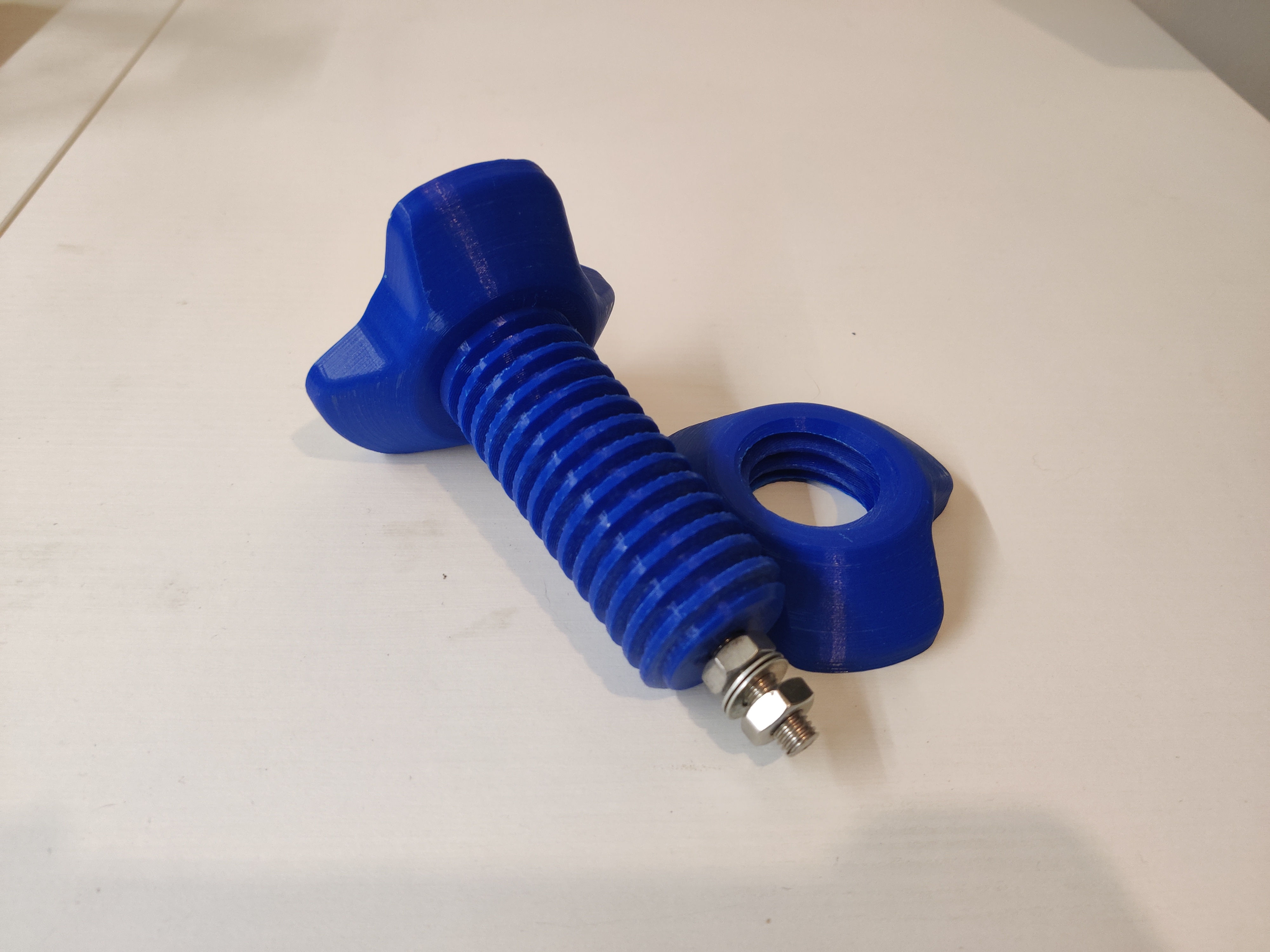 Universal spool holder with locking thread