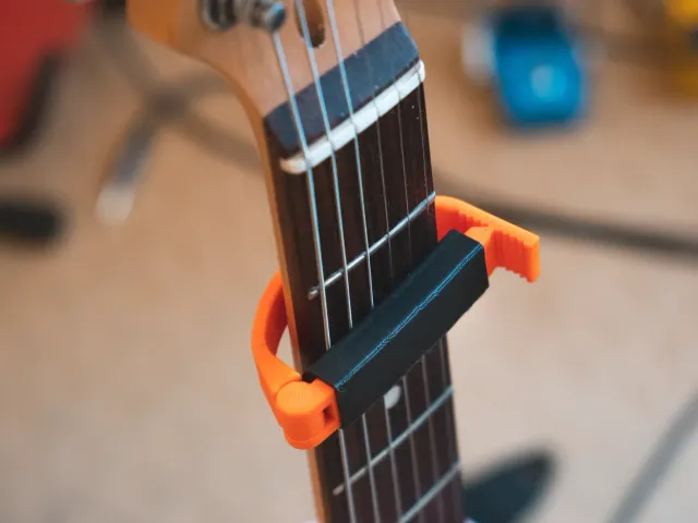 Ratcheting Guitar Capo - Looser Sleeve Design
