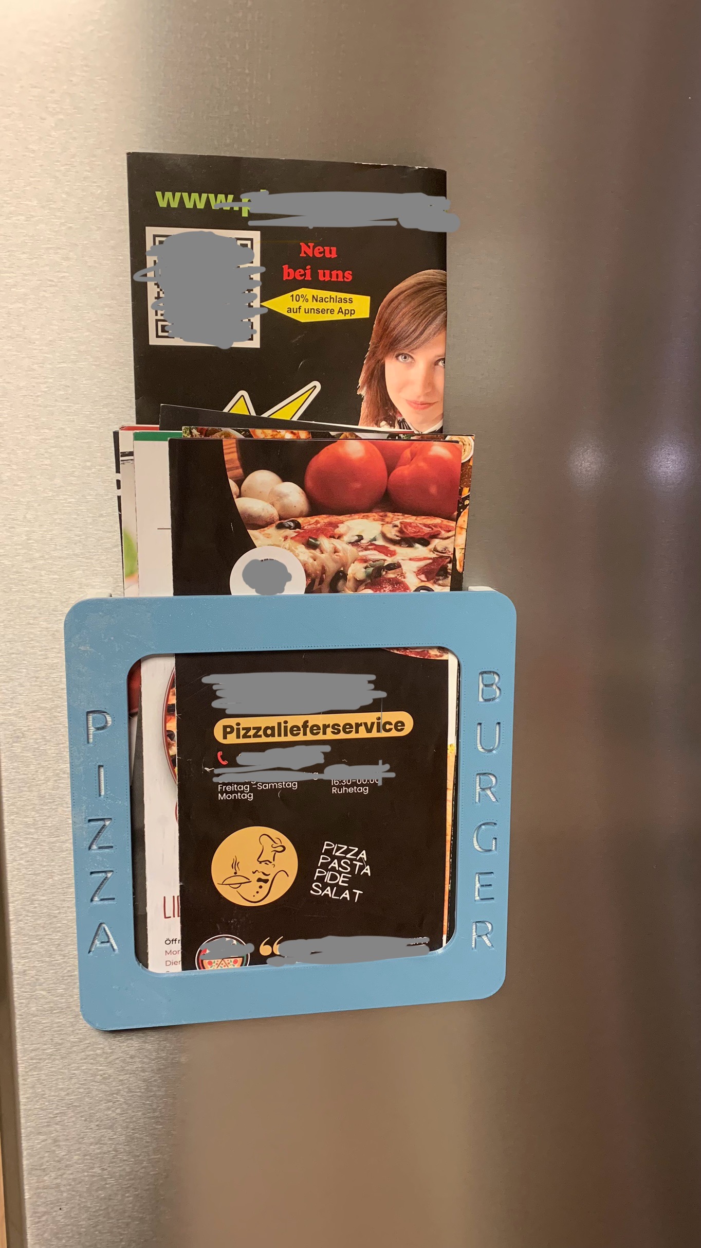 Magnetic fridge mount for delivery menus