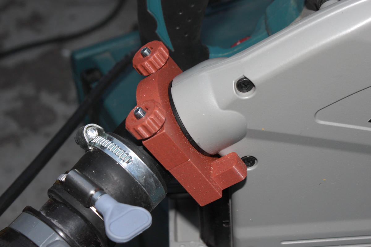 Dust port clamp for Makita SP6000J track saw