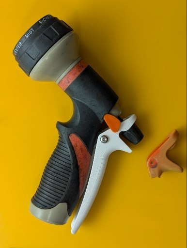 Replacement trigger lever for garden hose spray nozzle