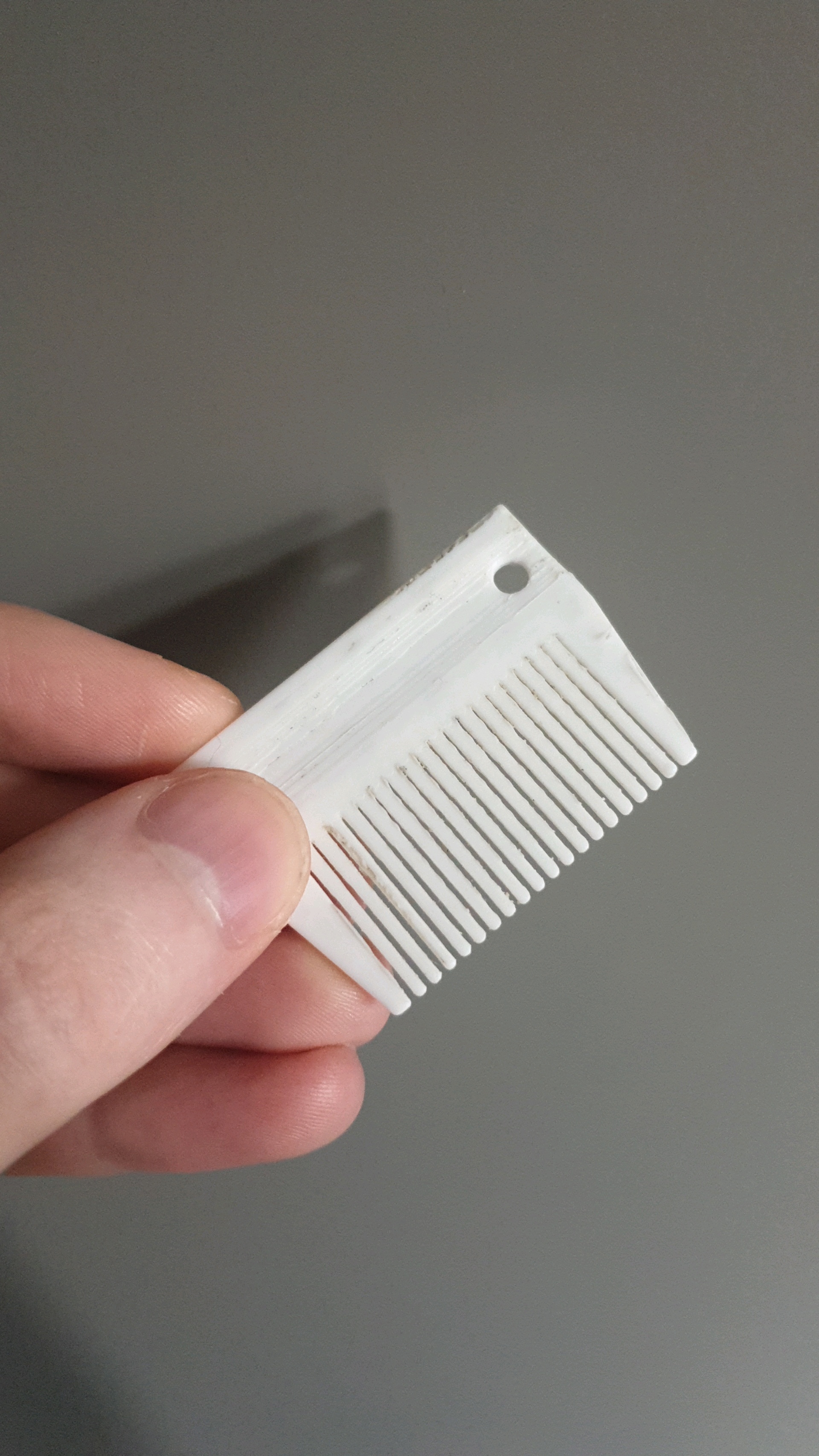 Small, narrow hair comb