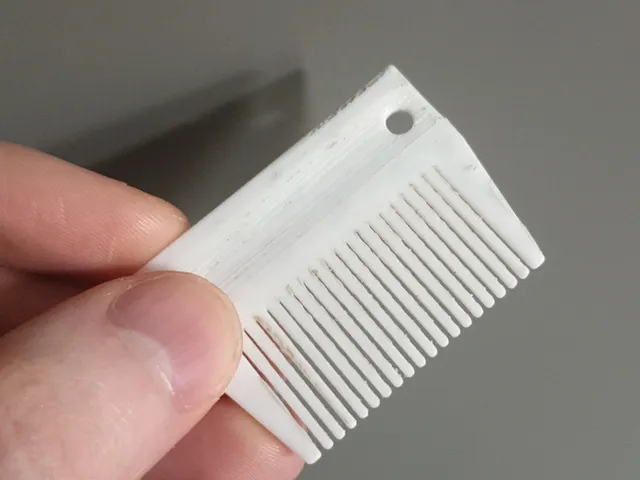 Small, narrow hair comb