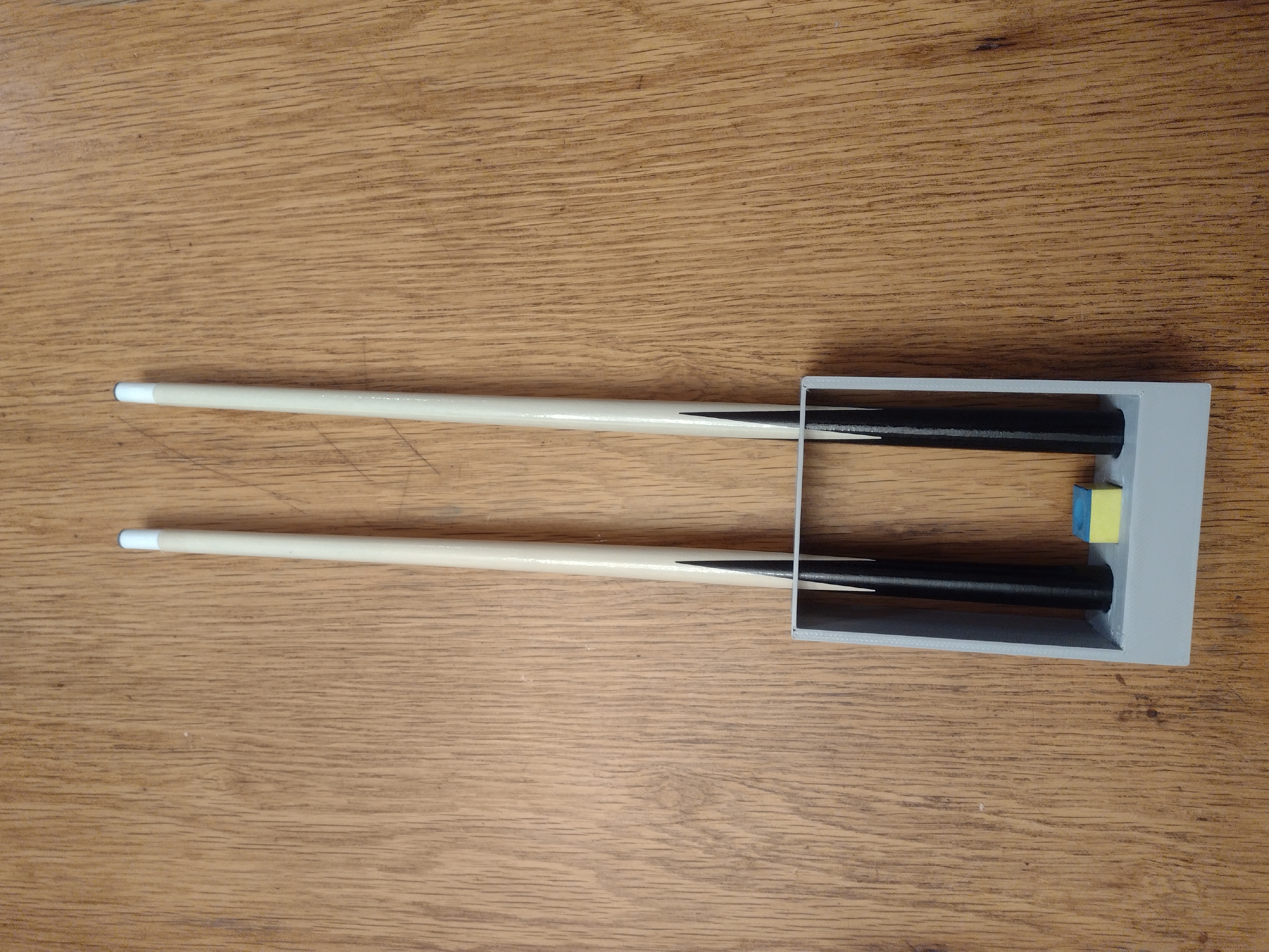 Mini tabletop pool stick holder