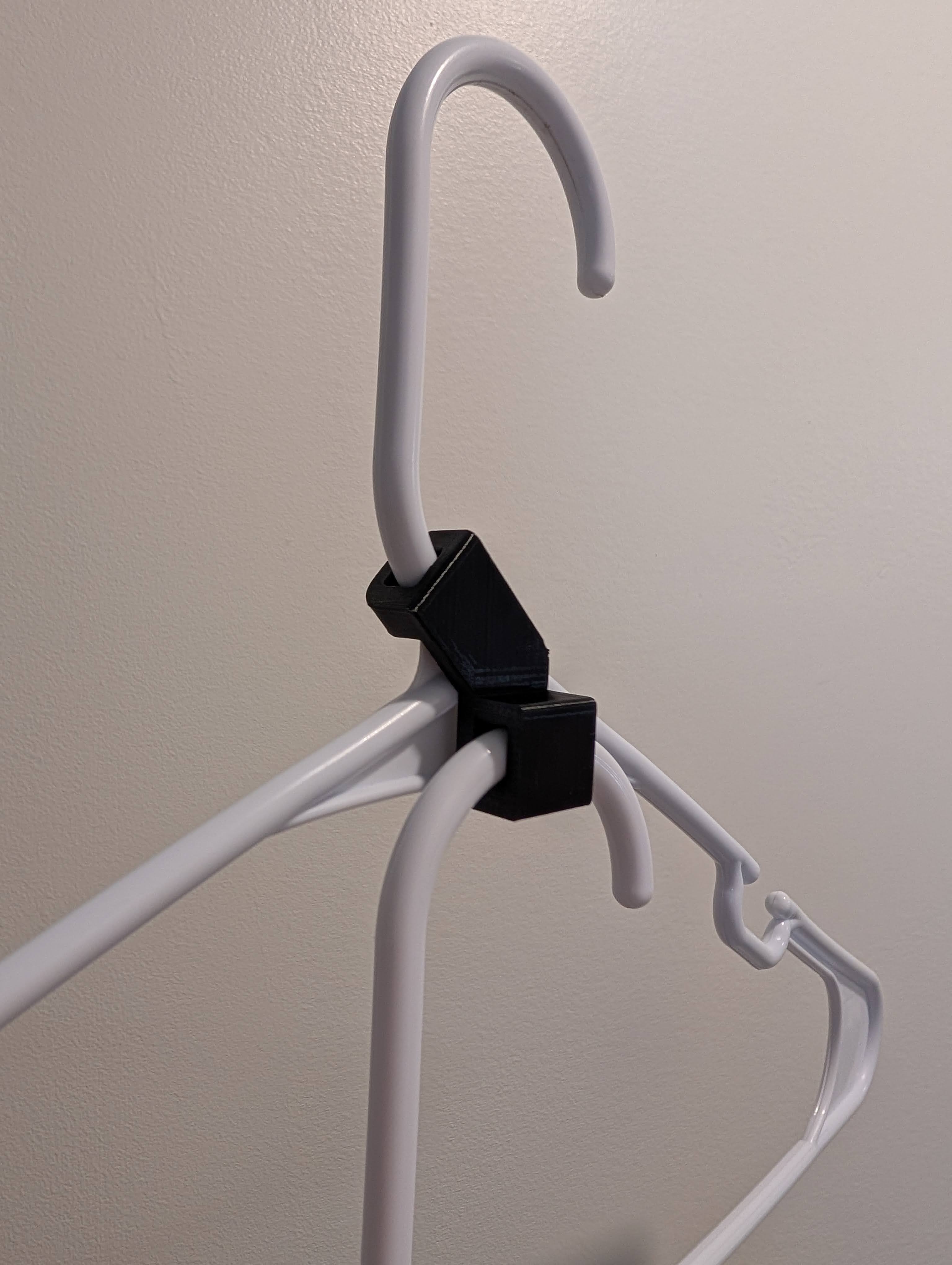 Plastic coat hanger extender