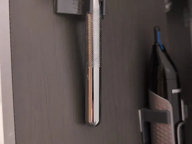 Safety Razor adhesive clip.