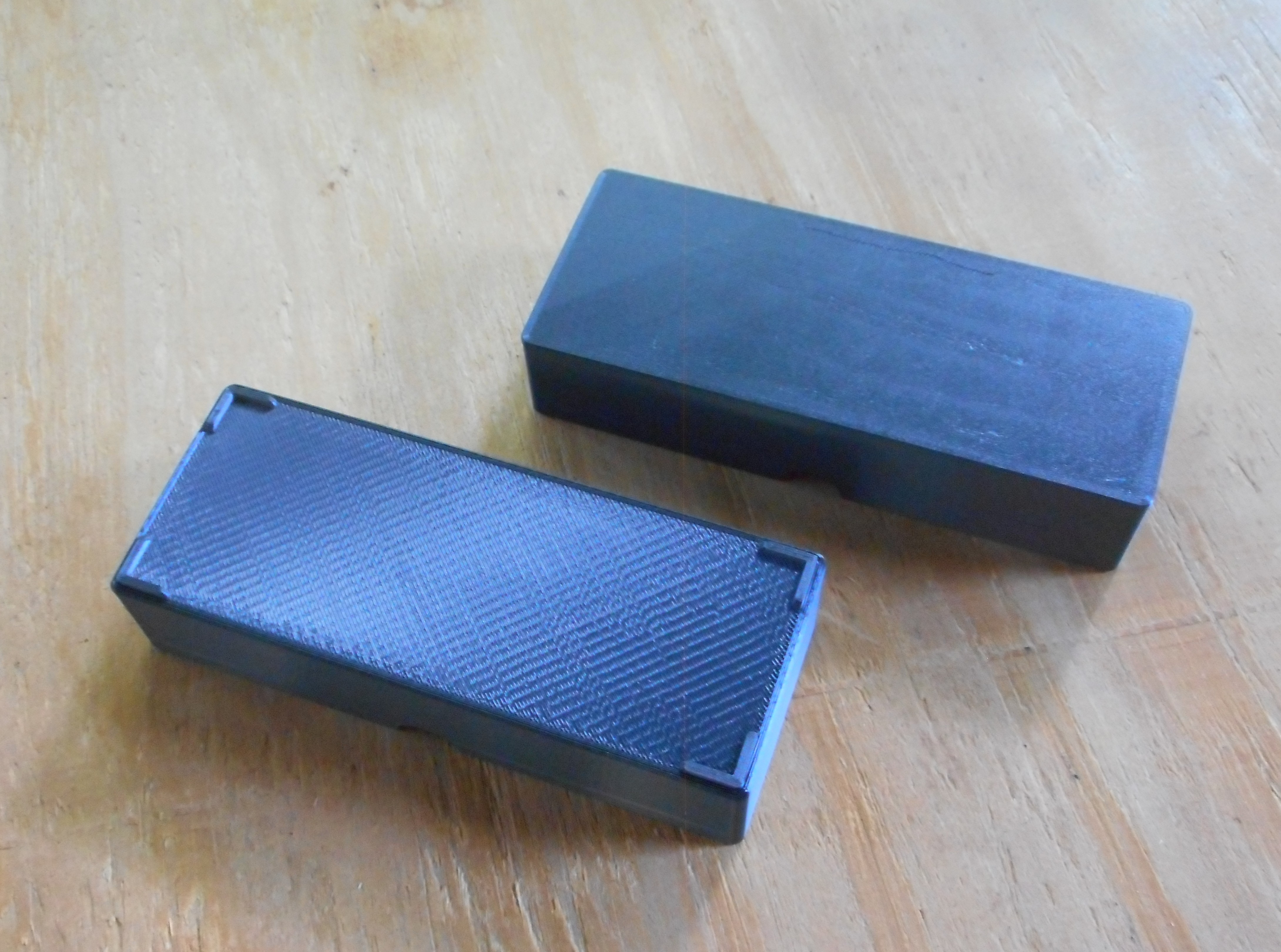 Two covers for my stackable holders for coin flips