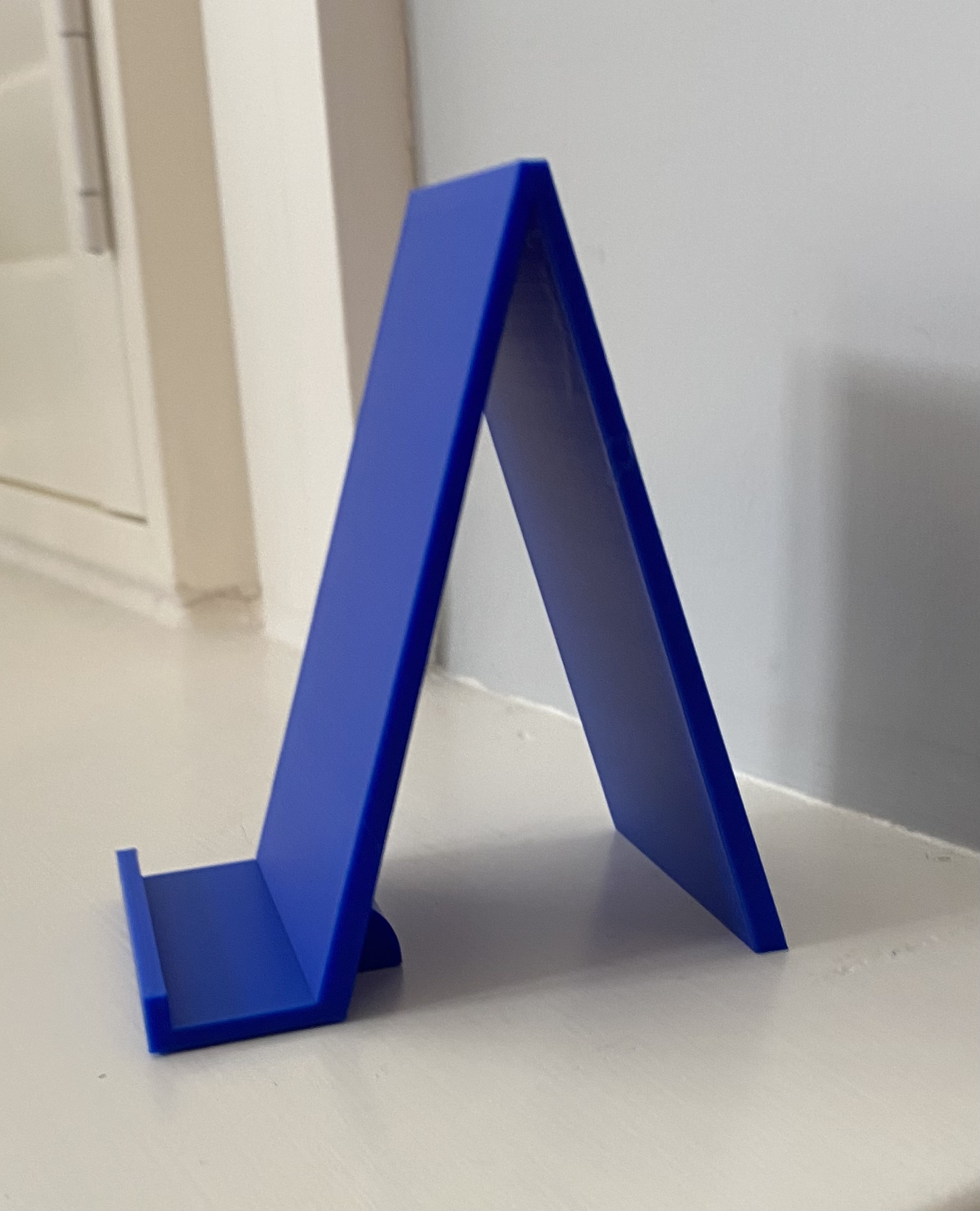 Phone Stand Simple Design With Support For Most Phone Types