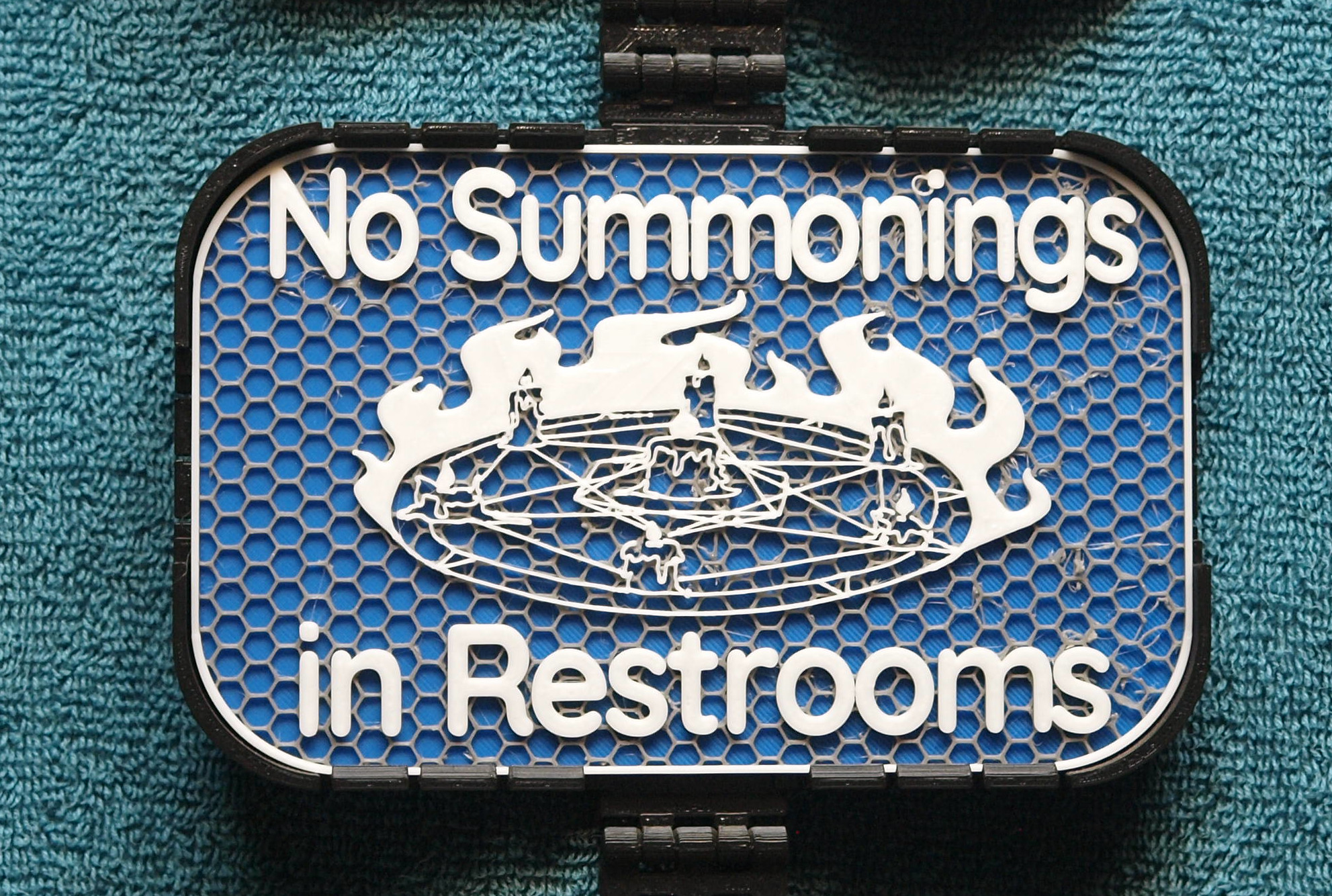 No Summonings in Restrooms sign