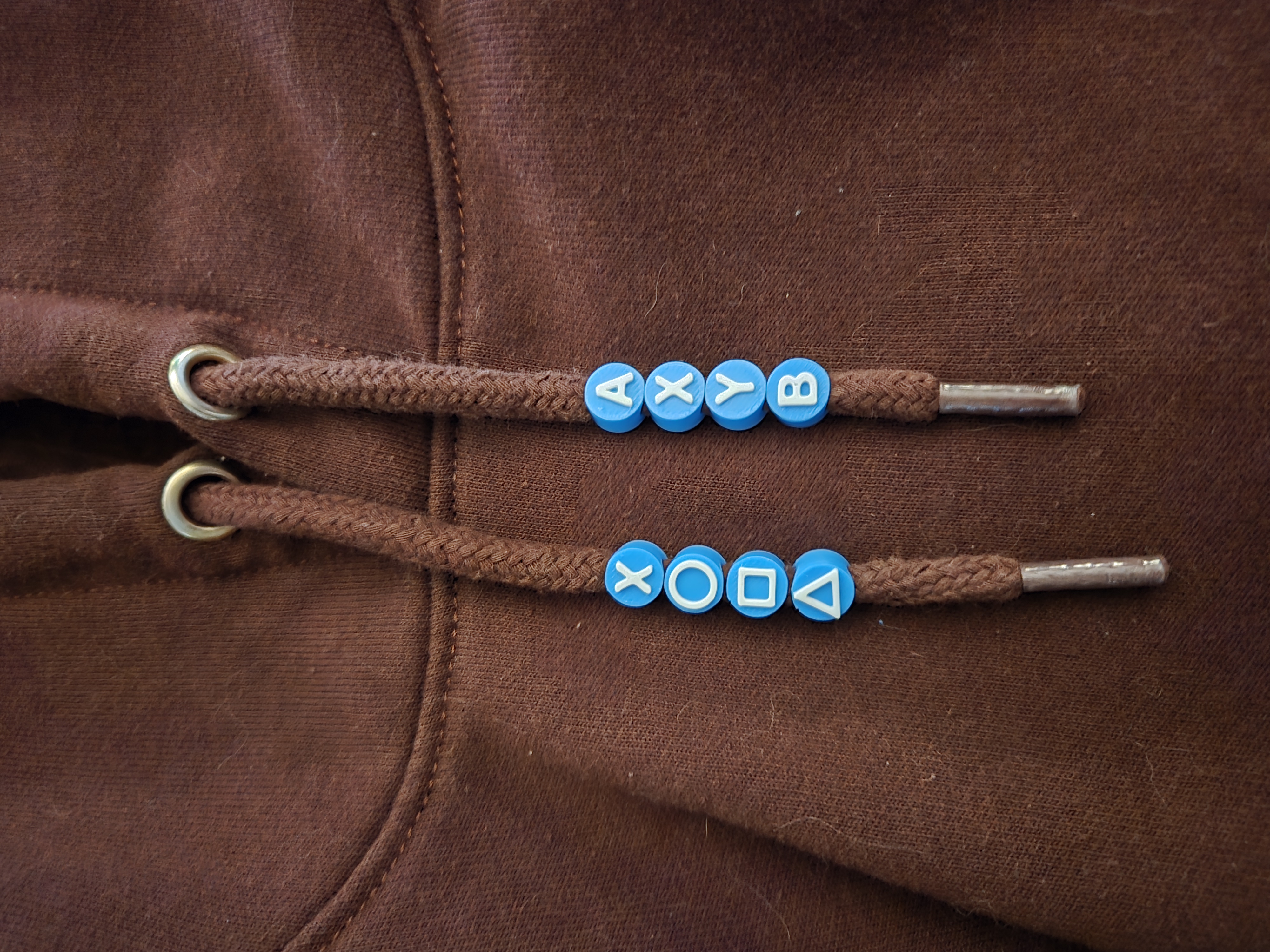 Xbox, PlayStation sets of controller buttons