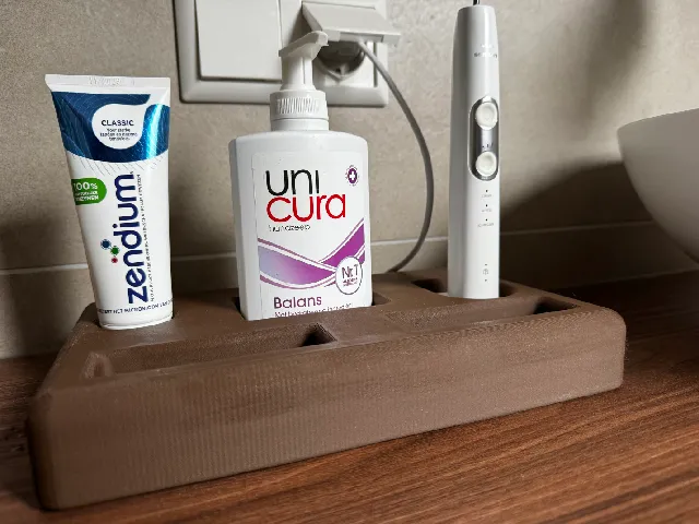 Toothpaste and brush holder