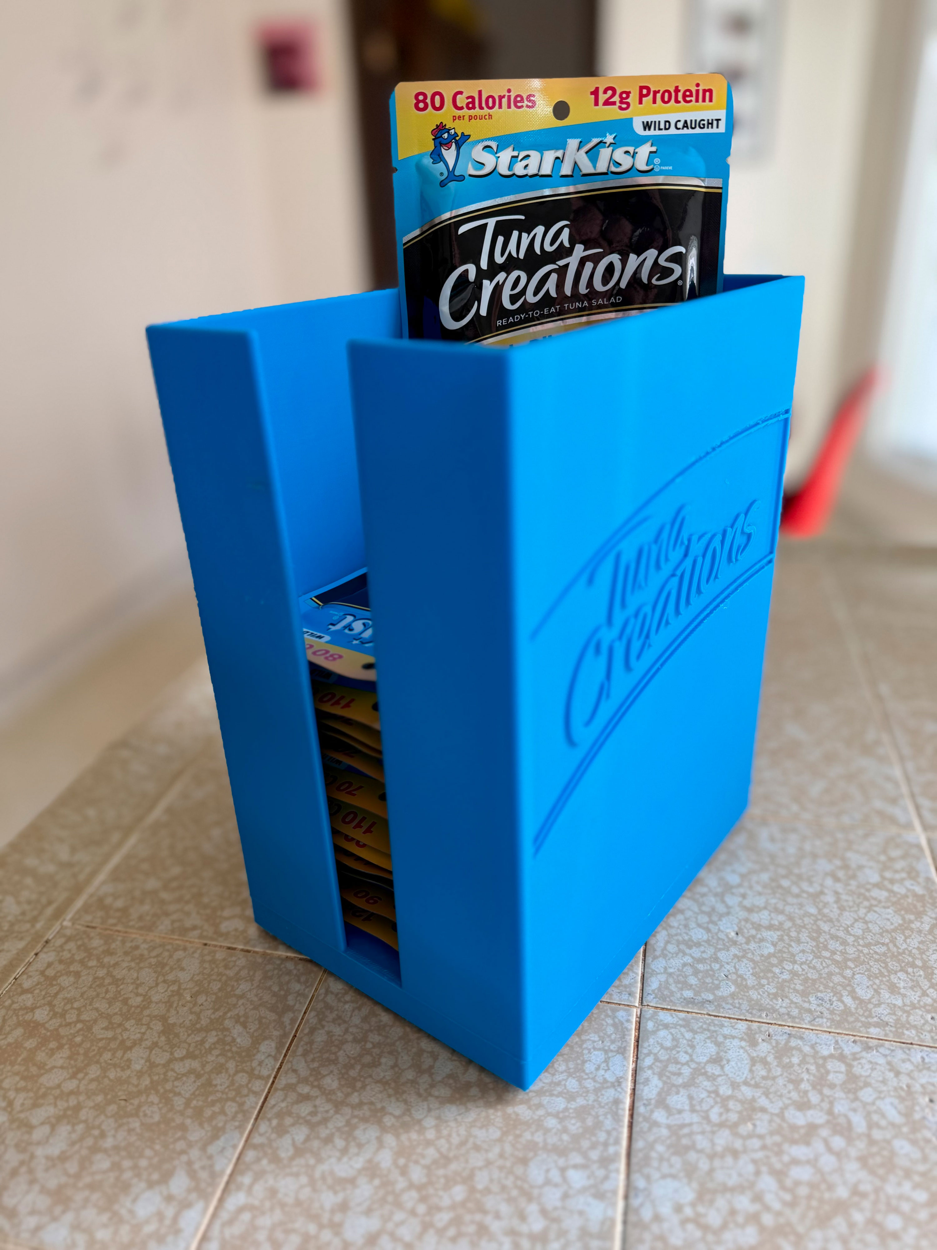 Tuna pouch dispenser