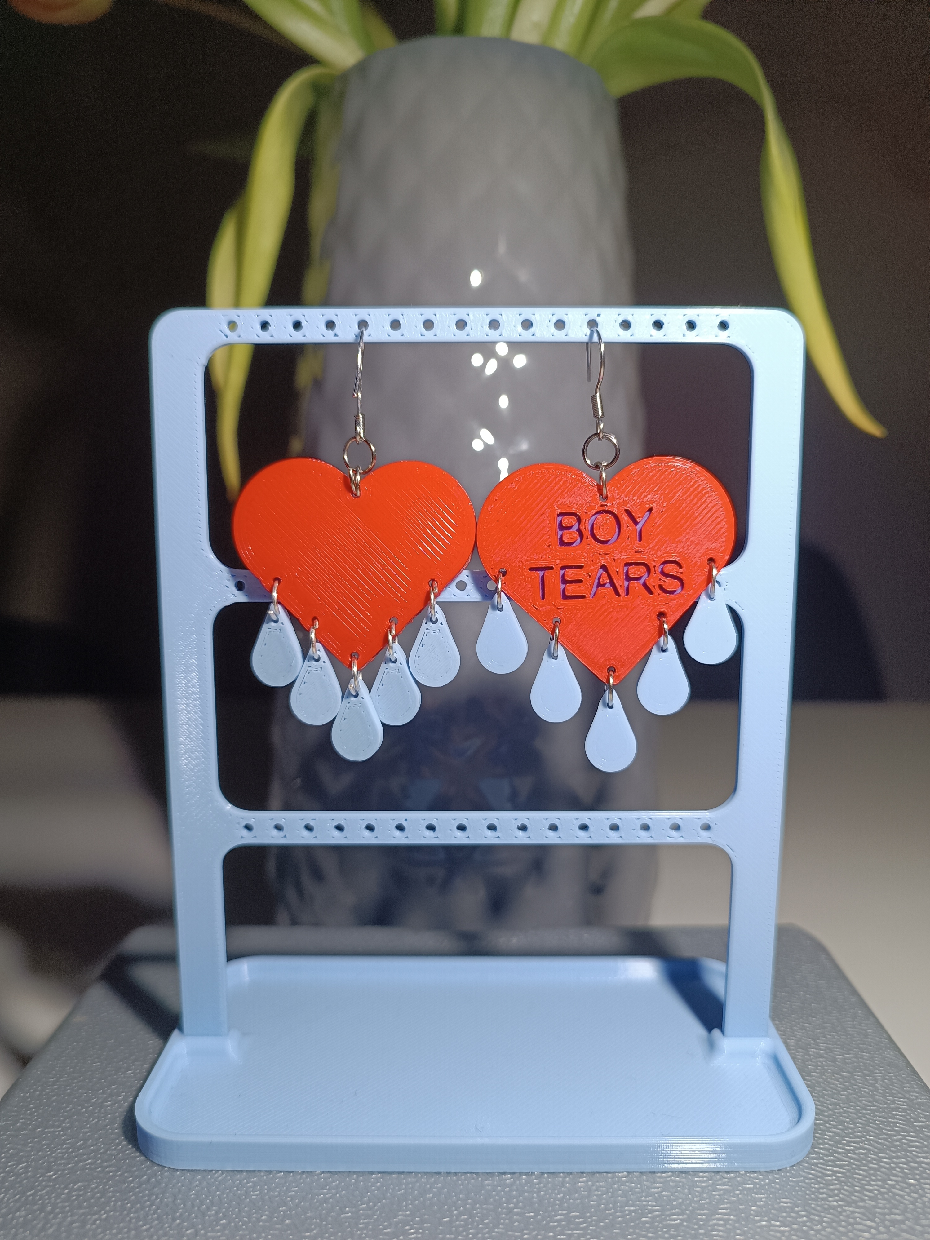 Boy tears earrings