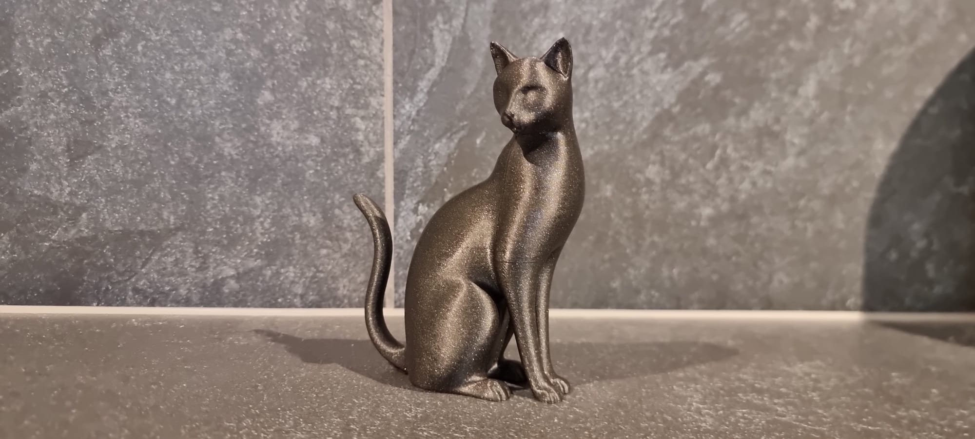 Elegant figurine of a sitting cat