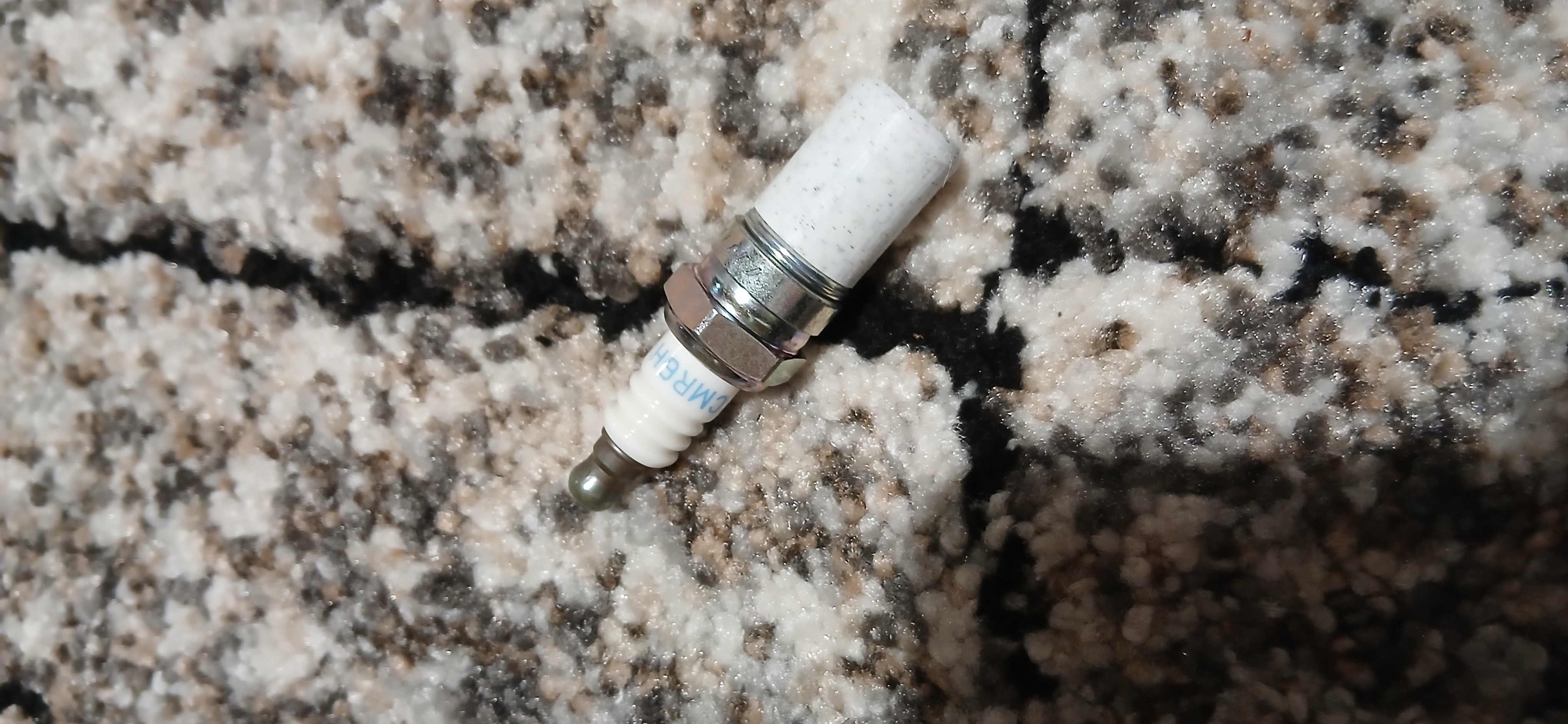 Spark plug safety cap