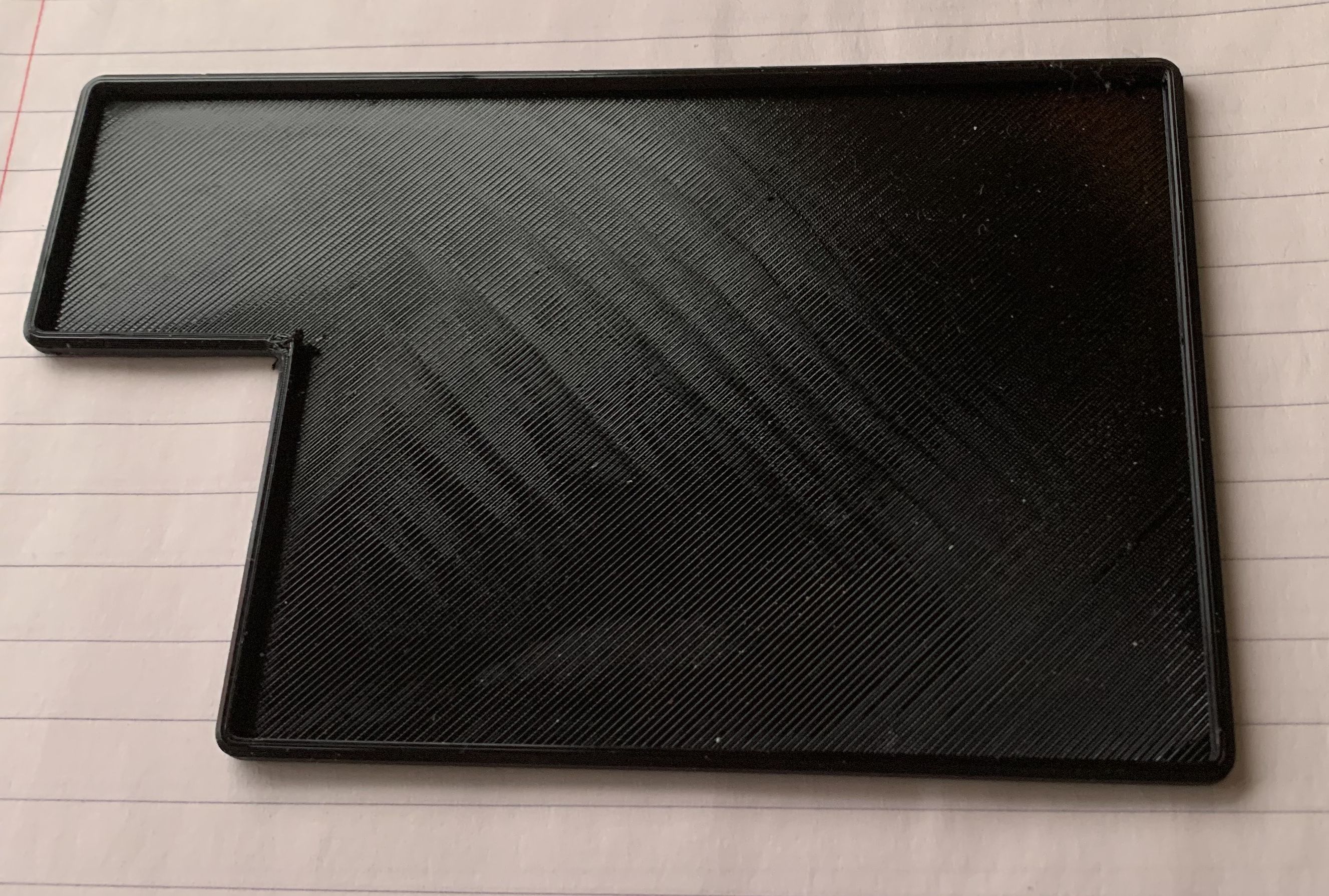 Anti-skid pad for a small desk organizer modeled by Robert Rose