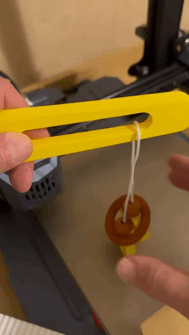 wooden ring and rope puzzle