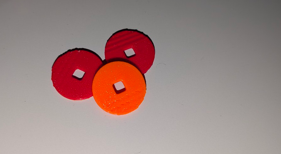 Coins which can fit on a shoelace (1.145cm diameter)