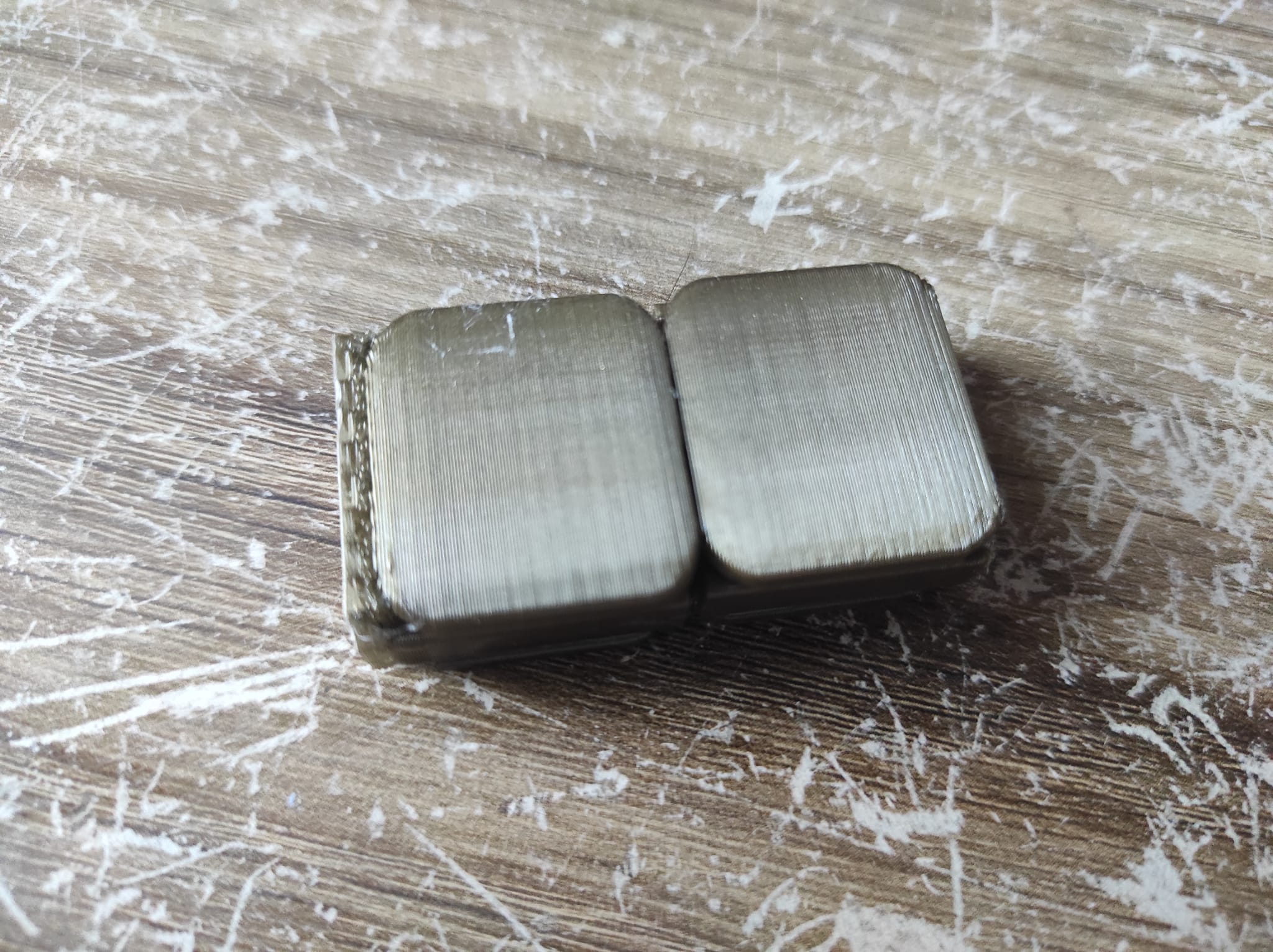 Pulls off a small two-part box