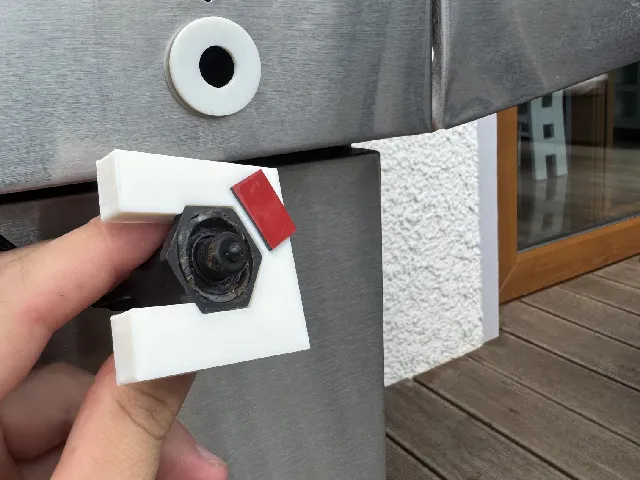 Grill spark button holder