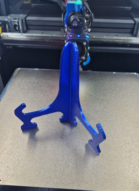 Live hinge print in place plate holder