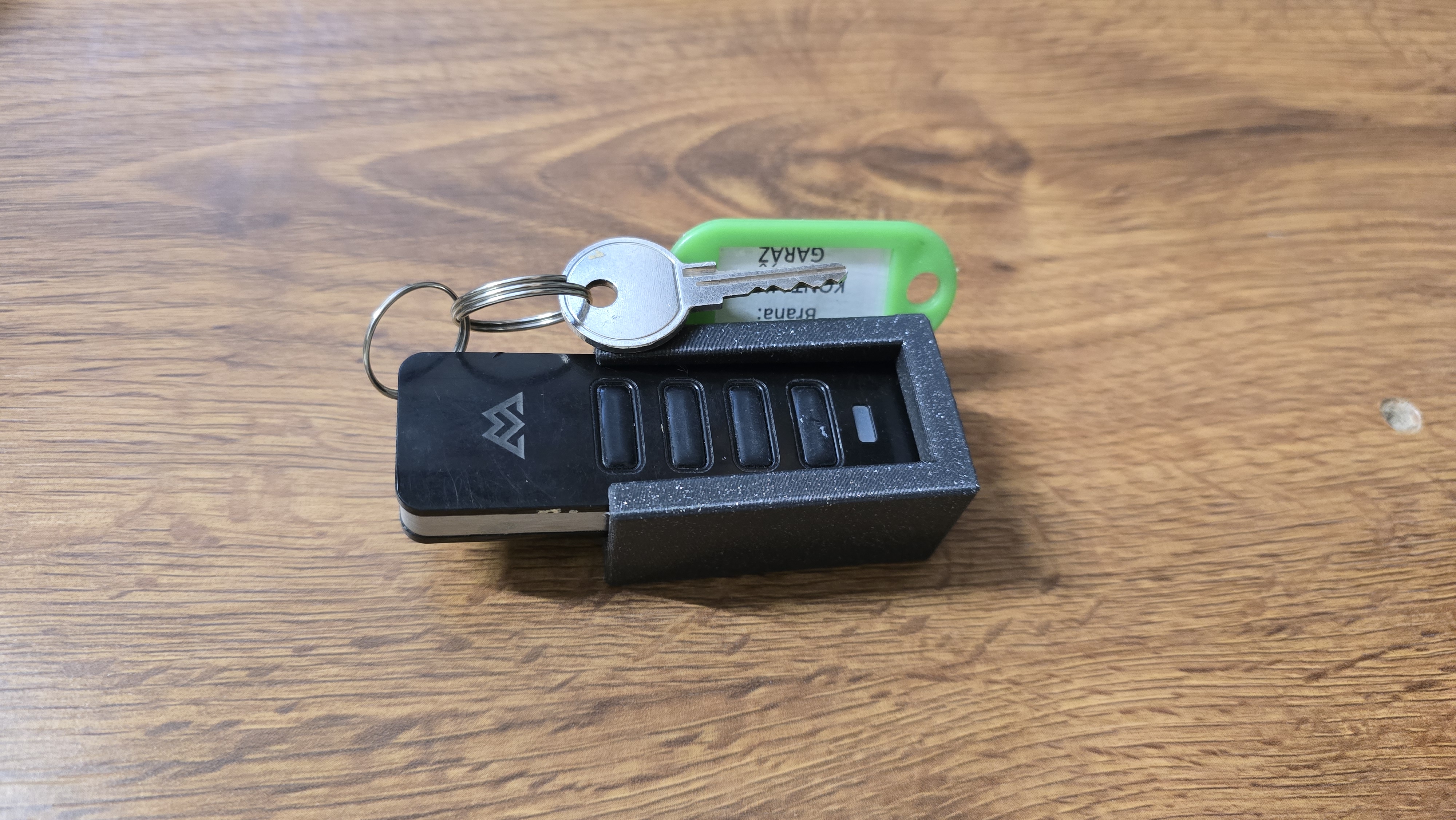 Garage gate remote holder