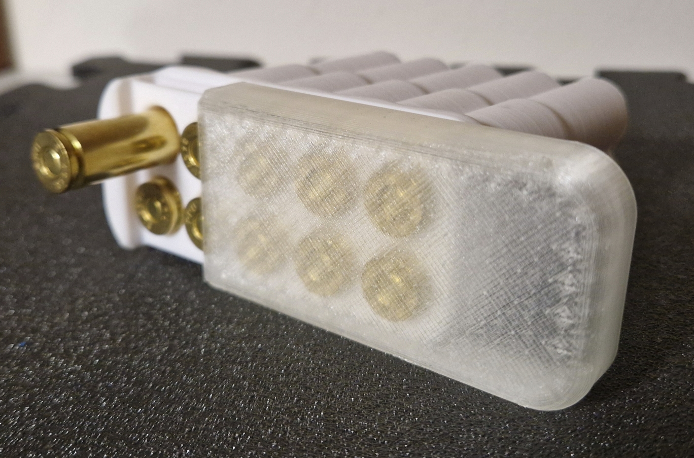Simple 10 round ammo box with sliding lid and snap lock for caliber 8x57 mm IS / 8 mm Mauser