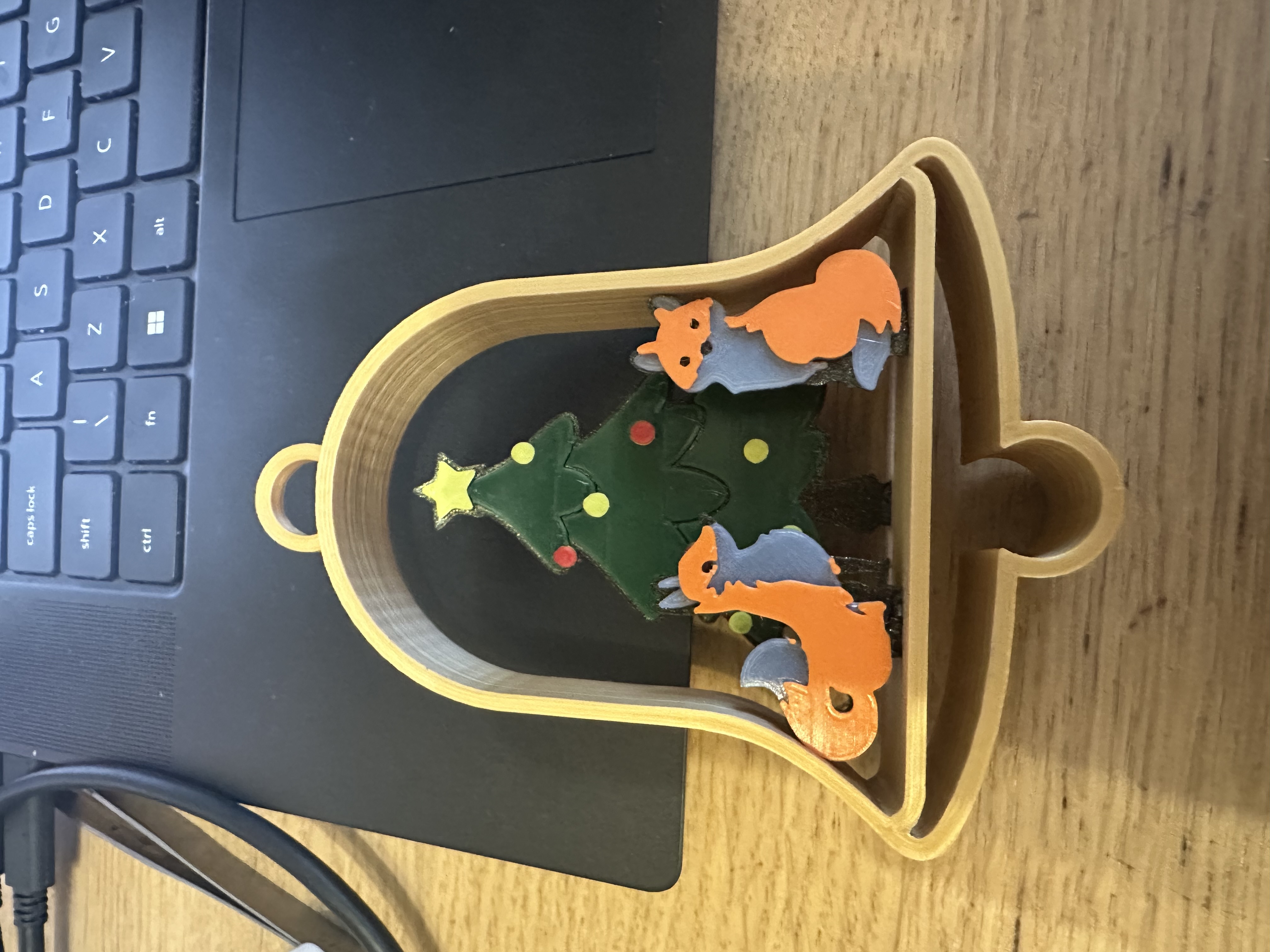 X mas bell with tree and foxes