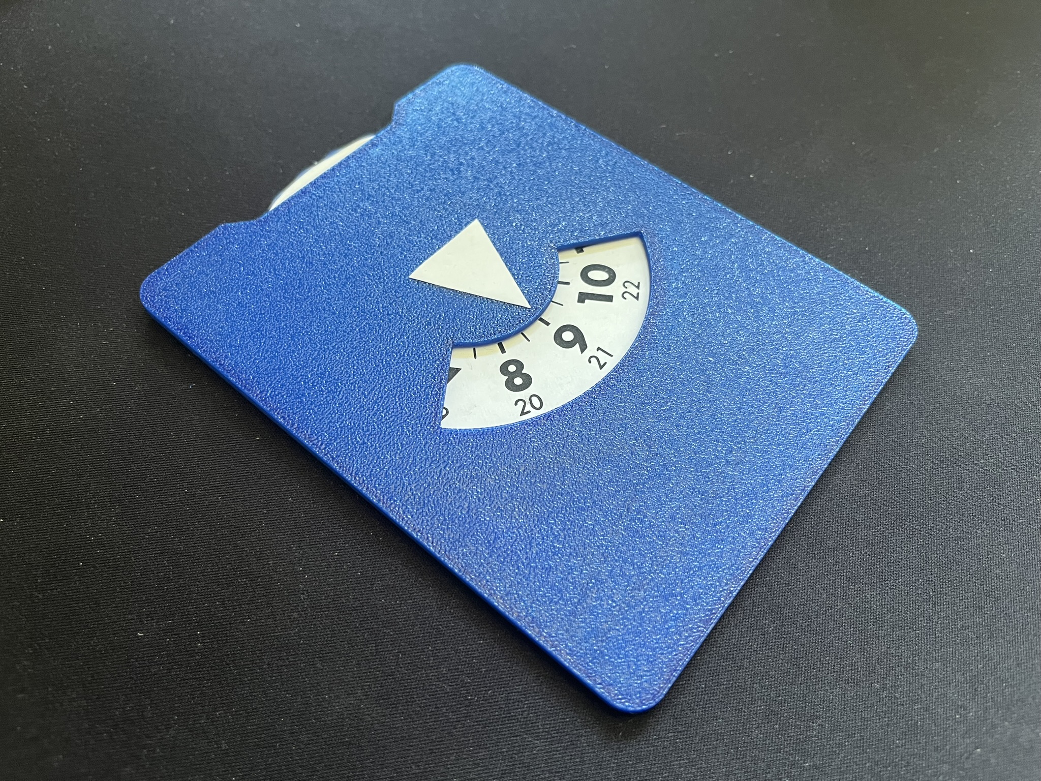 Parking disc (single filament, glued-on paper dial)