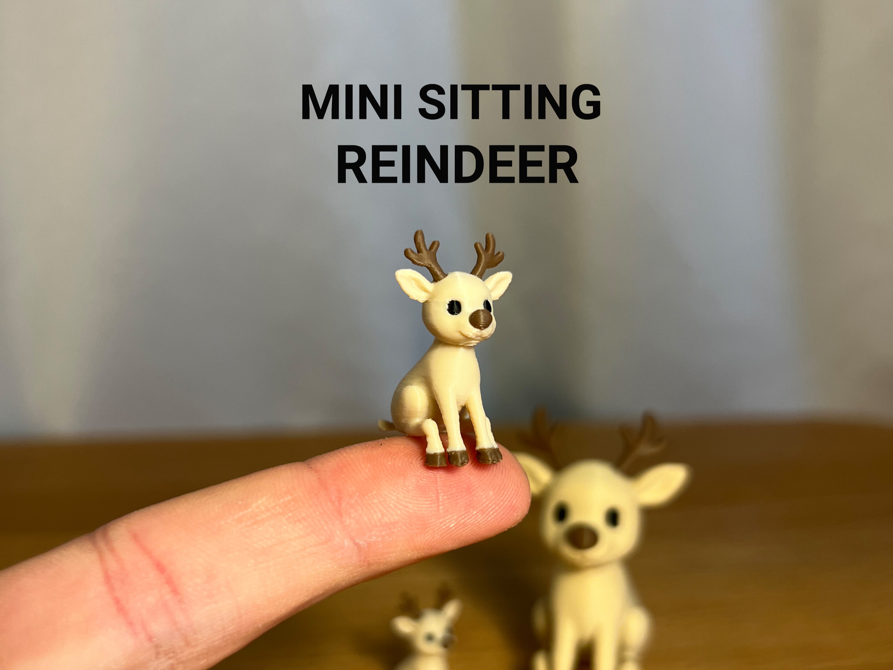 Mini Sitting Reindeer