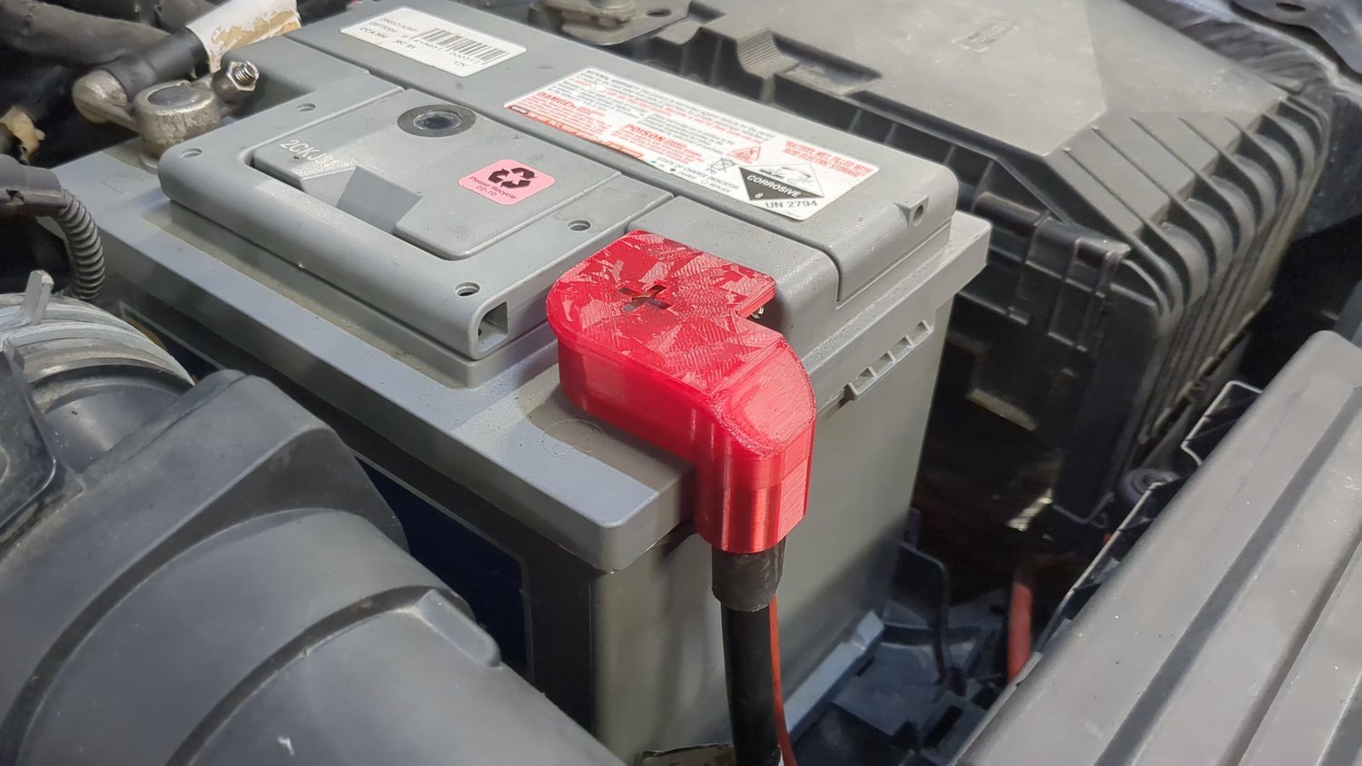 VW positive battery terminal cover