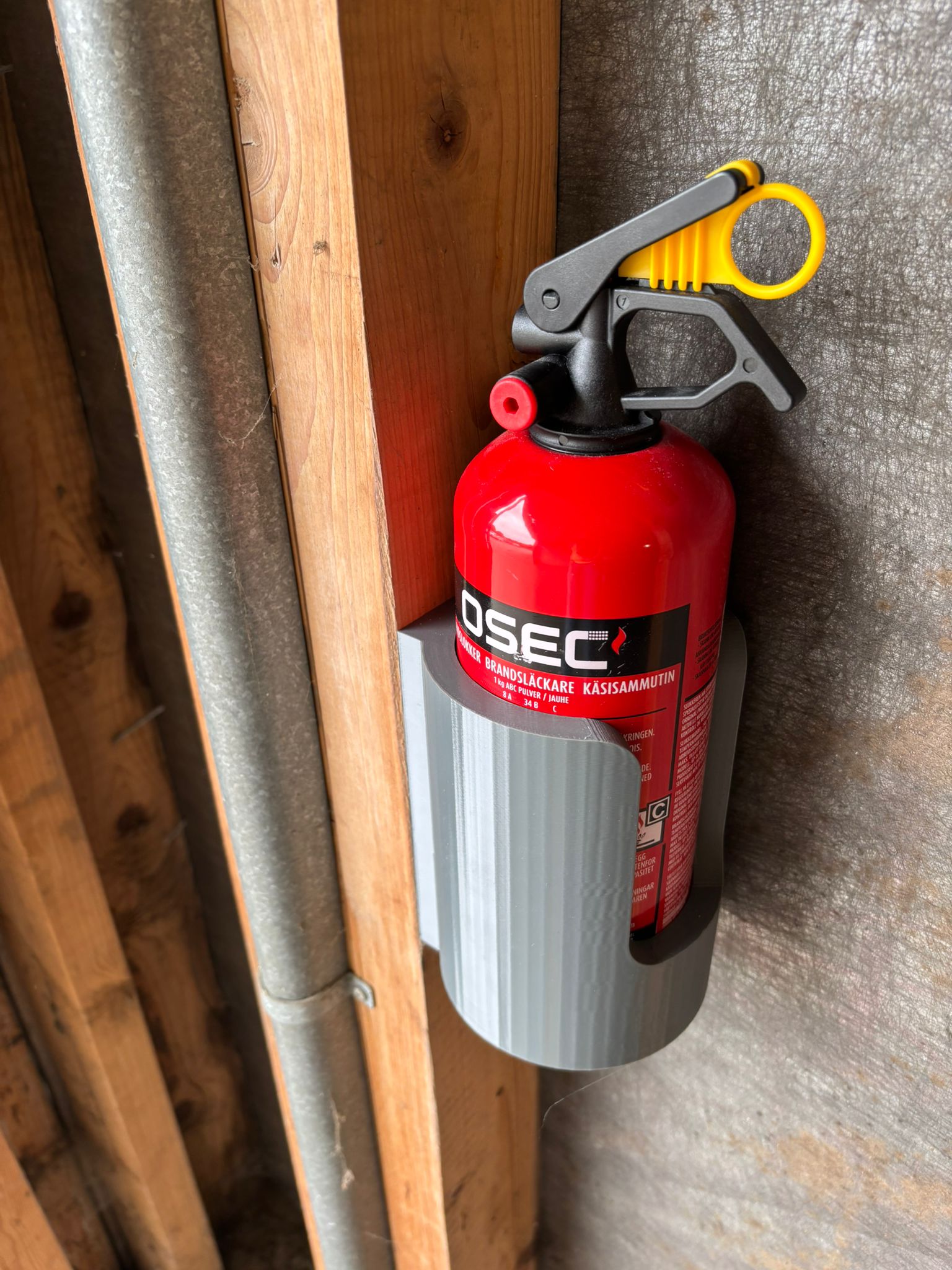 Fire extinguisher holder