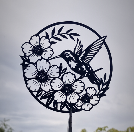 Hummingbird Among Flowers in a Circular Frame