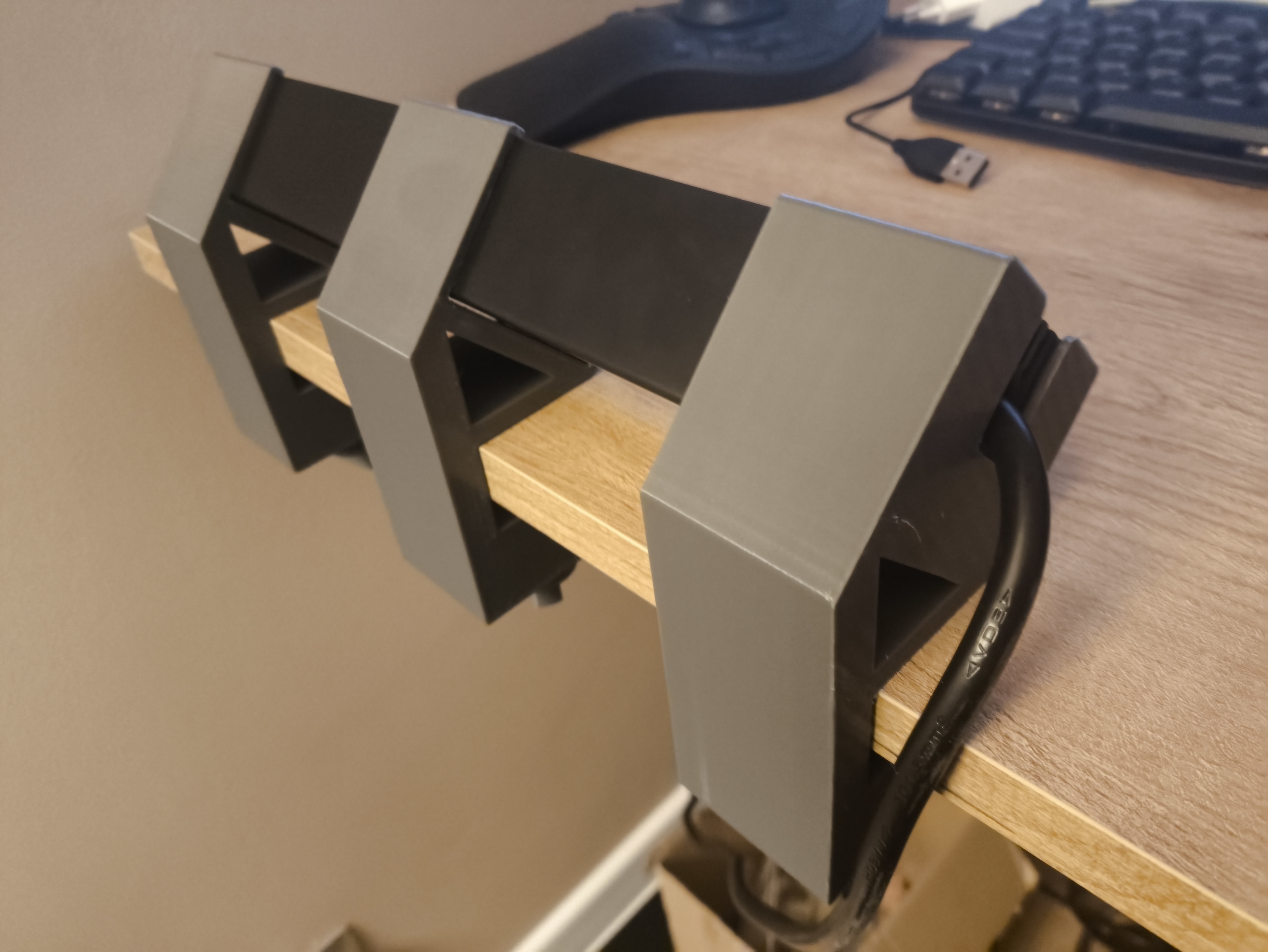 Holder with clamp for power strip Brennenstuhl