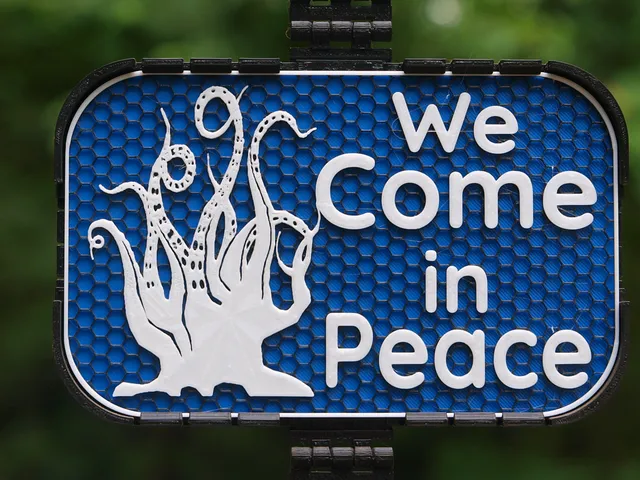 We Come in Peace sign
