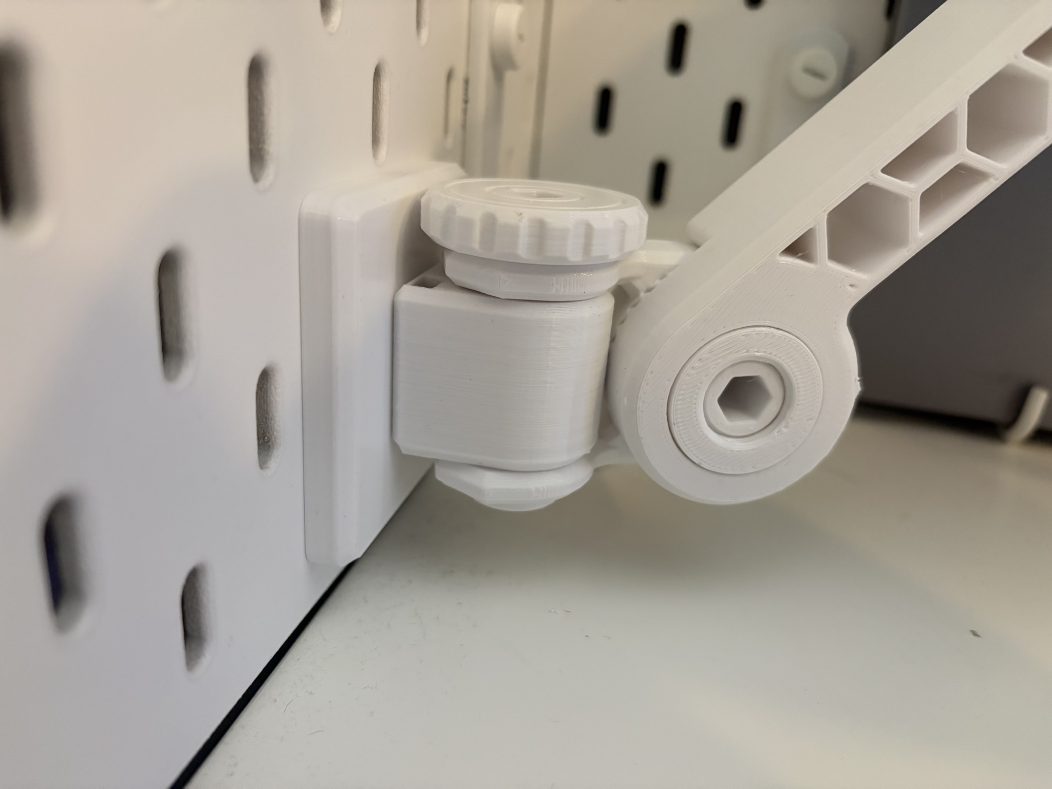 Hinged holder for Multifunction Arm mounting system (small)