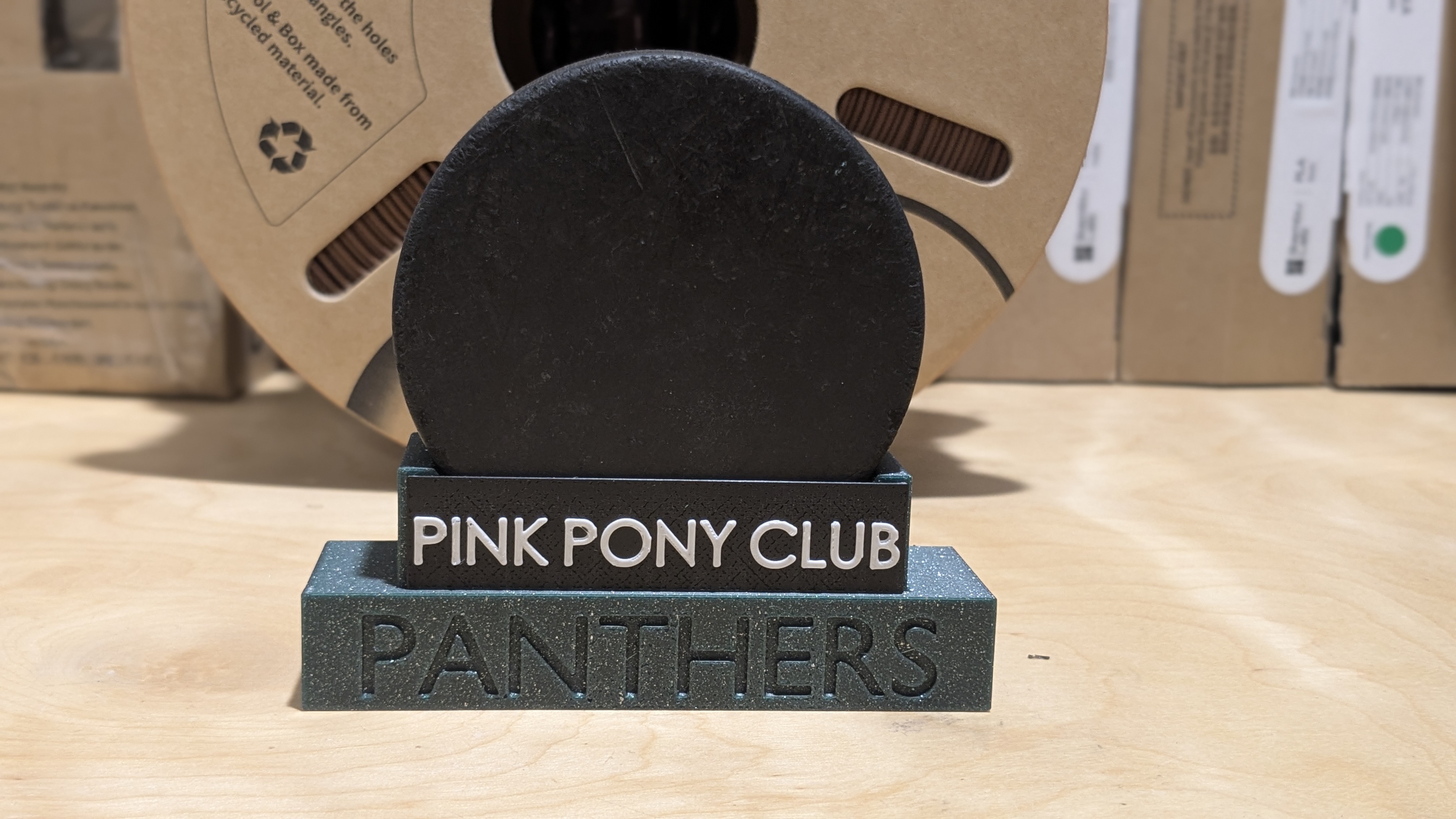 Hockey Puck Stand with Labels 3D model