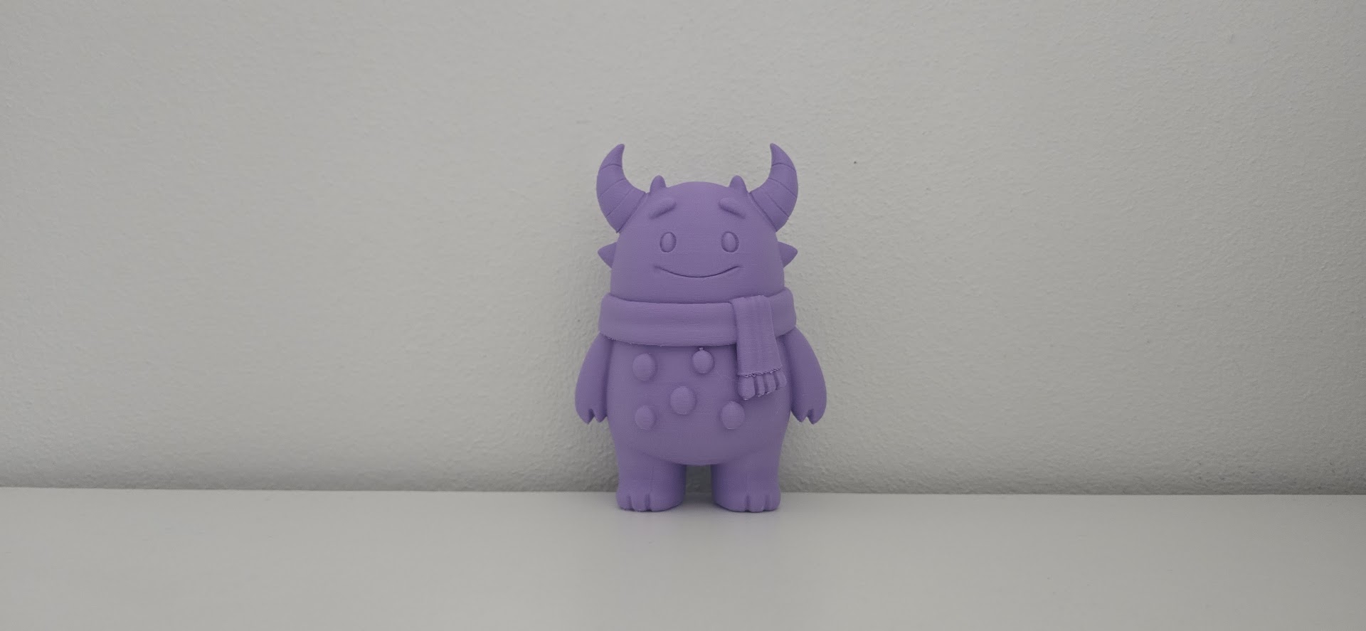Cute Horned Monster with Scarf Winter Figurine