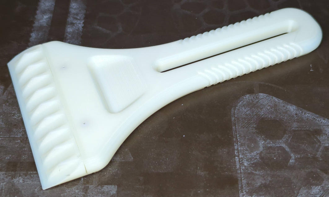 Ultimate Ice Scraper with detachable blade - OpenSCAD