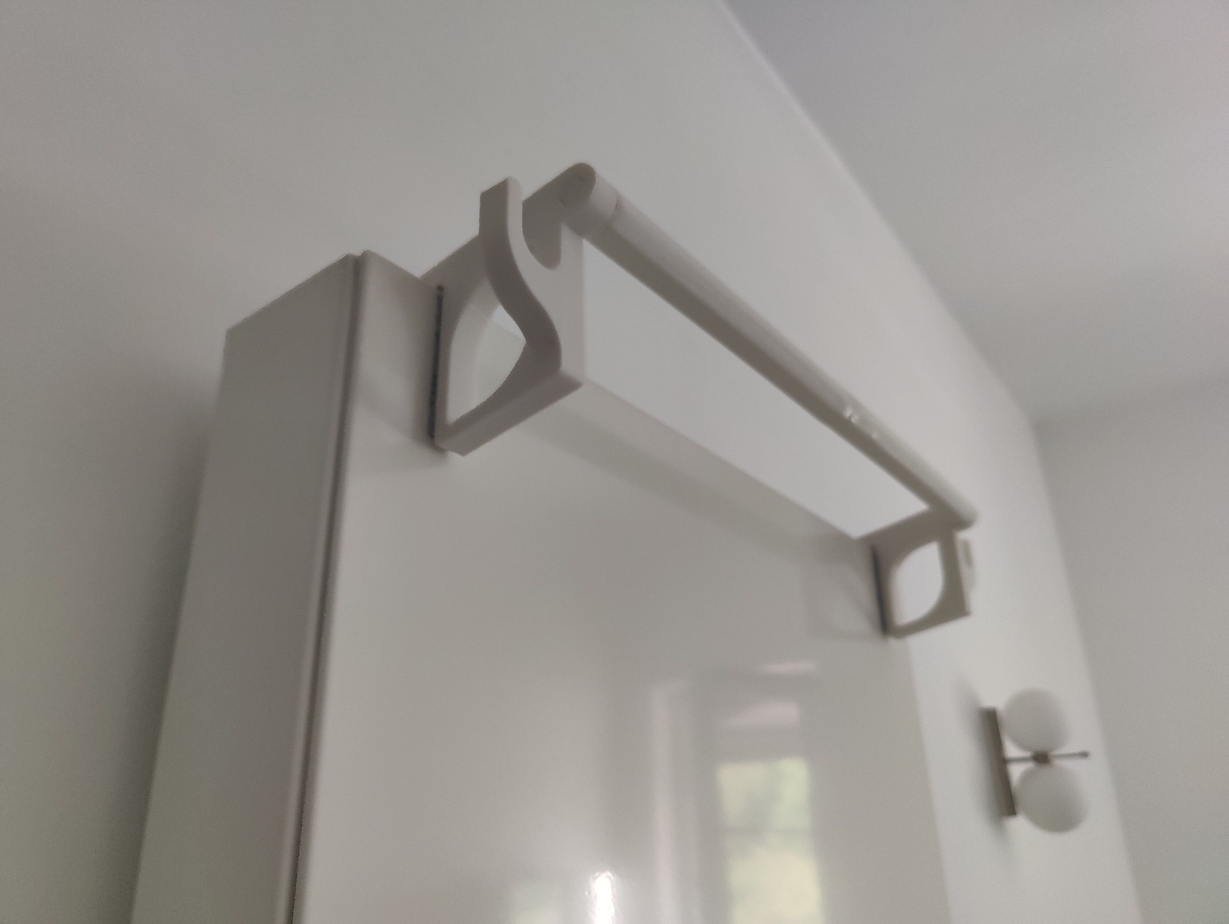 Radiator towel hanger with side hooks