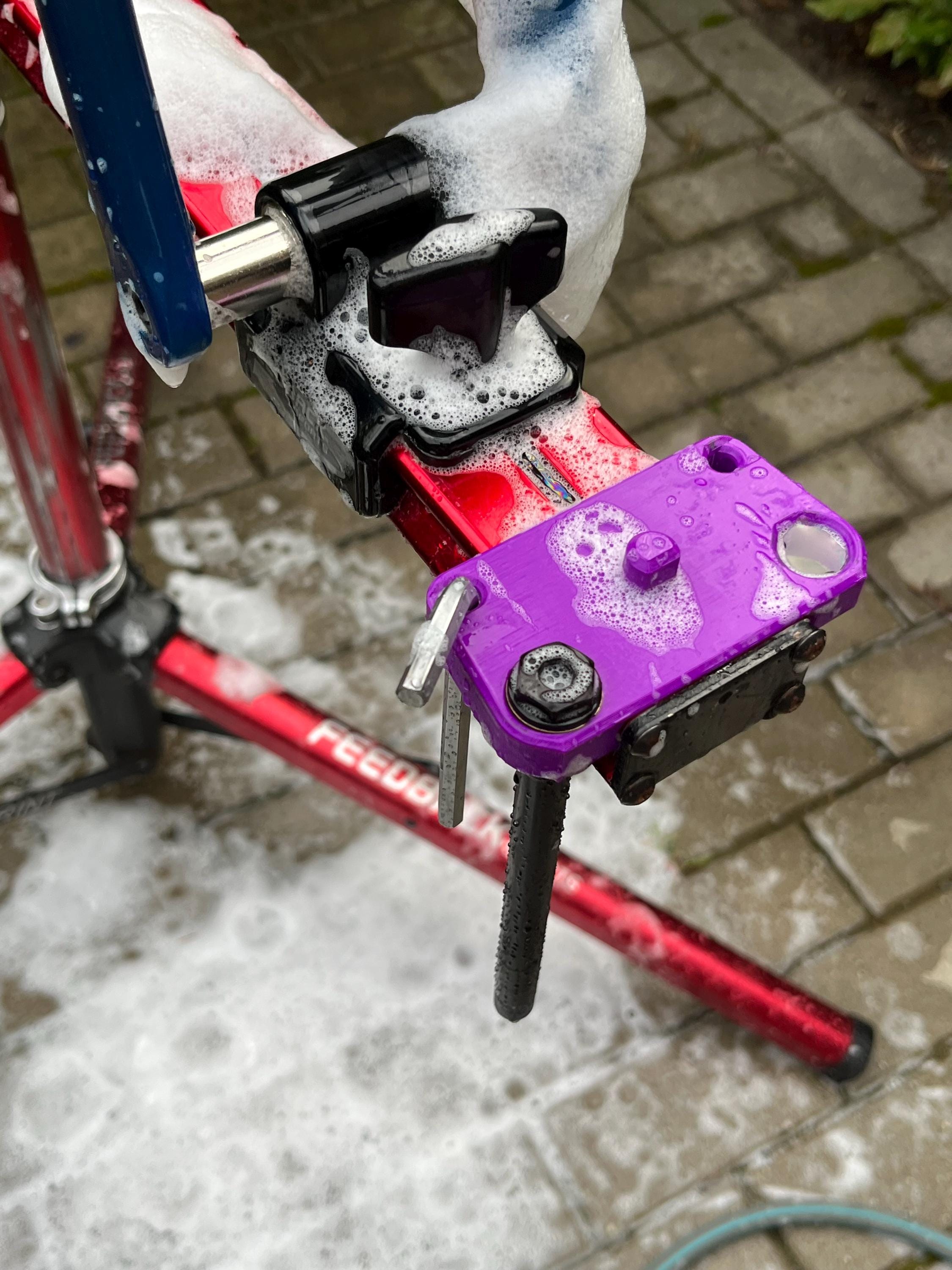 Axle and tool holder for Feedback Sports Sprint work stand
