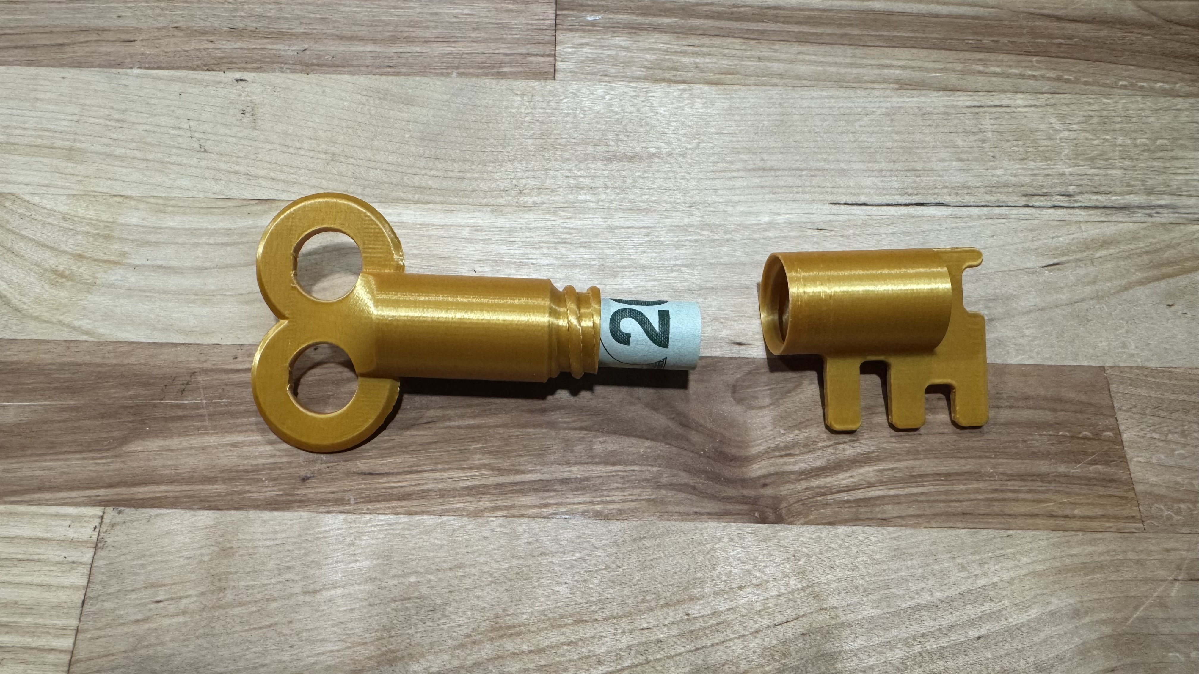Key shaped money holder