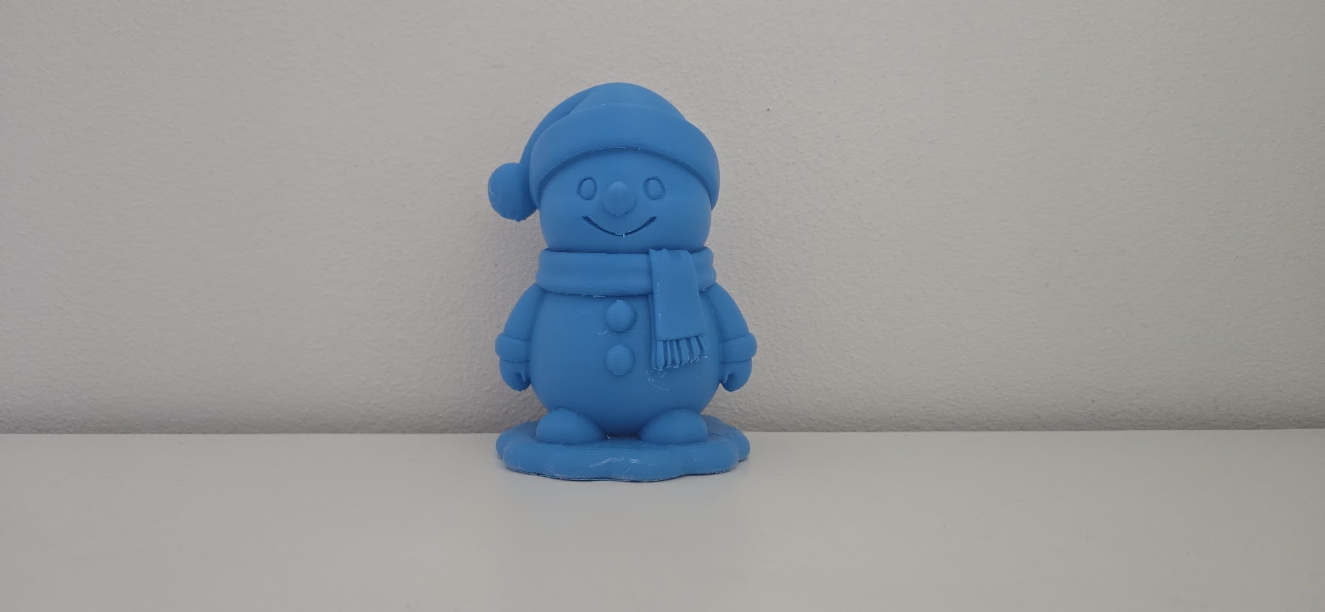 Simple Smiling Snowman on Snow Base Christmas Figurine