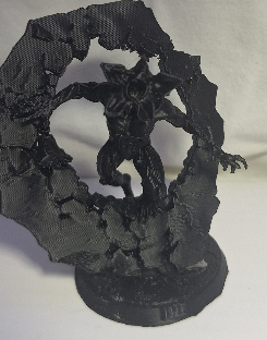 Demogorgon ripping through a wall