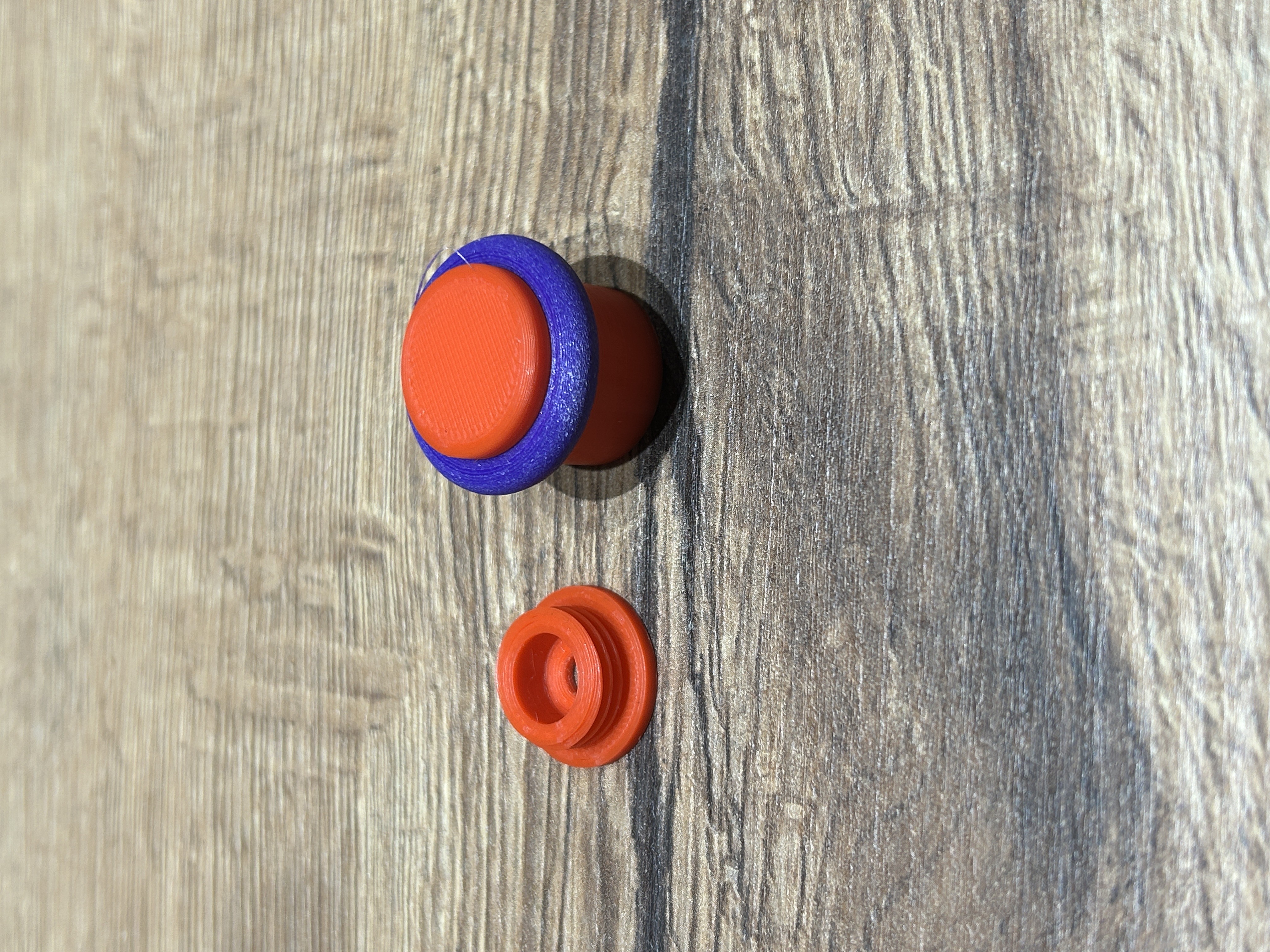 Traditional floor-mounted door stopper with modular design.