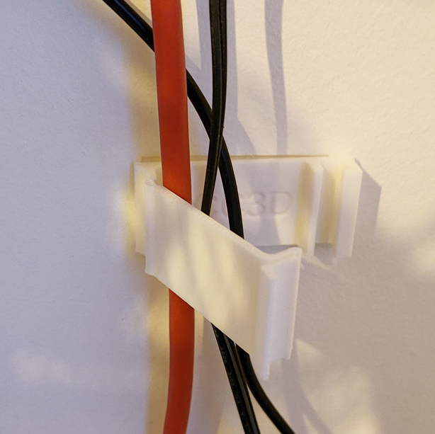 Cable clip print in place for self adhesive tape