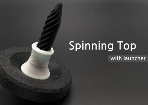 Pass Through Fidget Inspired Spinning Top: Vertical Launch