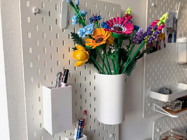 SKADIS Hidden battery dispenser / pen container / magnet board / vase.